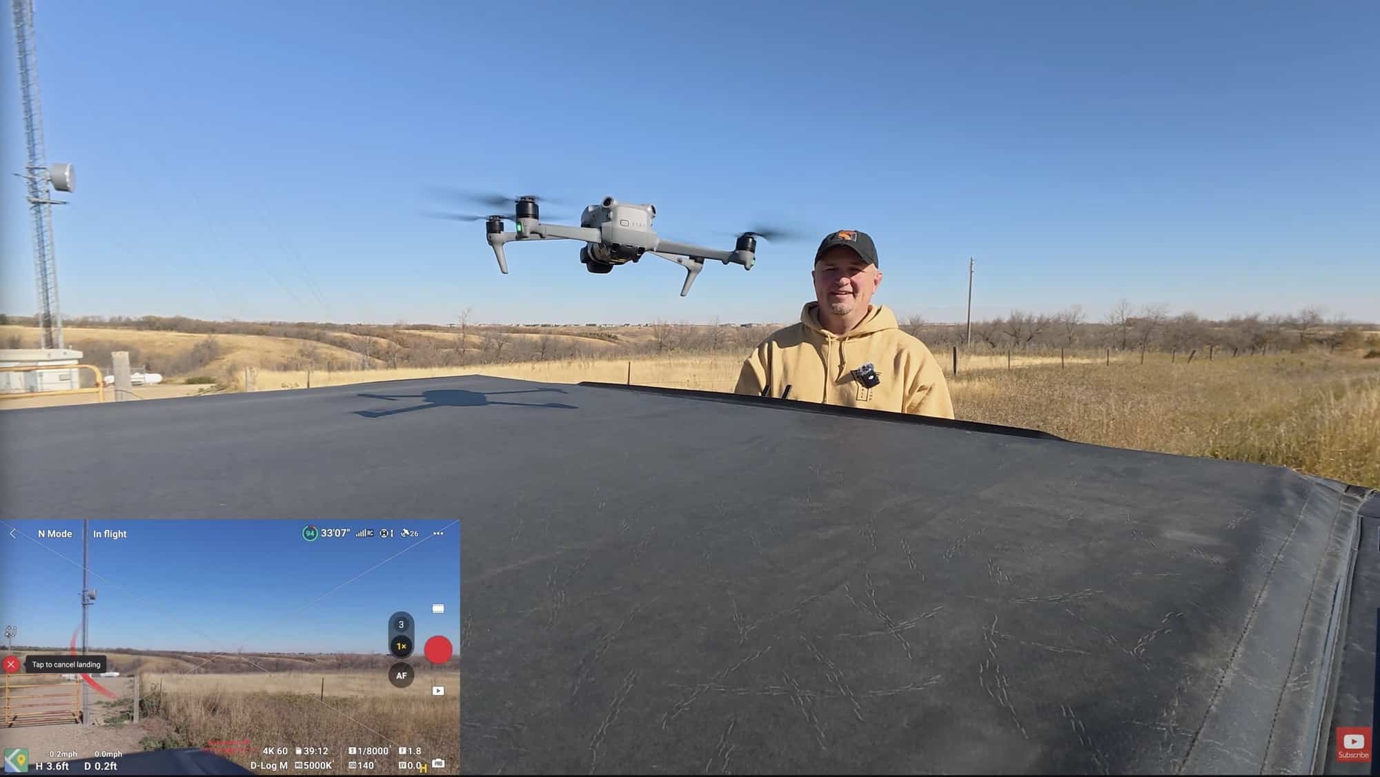 Man on a rooftop faces a hovering DJI Air 3S with the flight app inset.