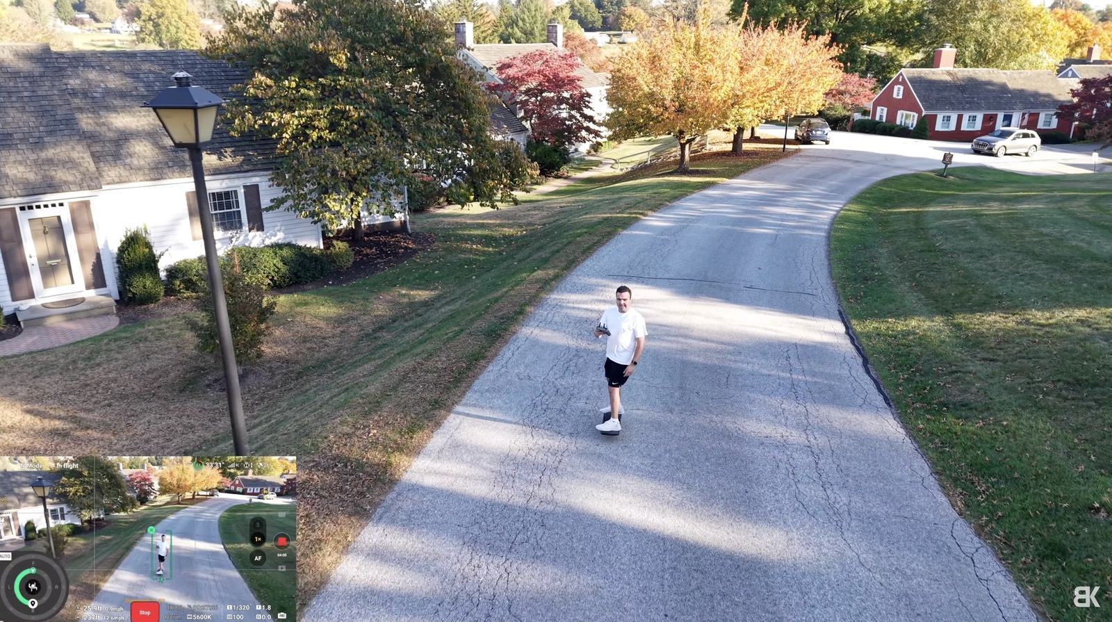 DJI Air 3S lifting off for its first ActiveTrack 360 flight along a wooded trail.