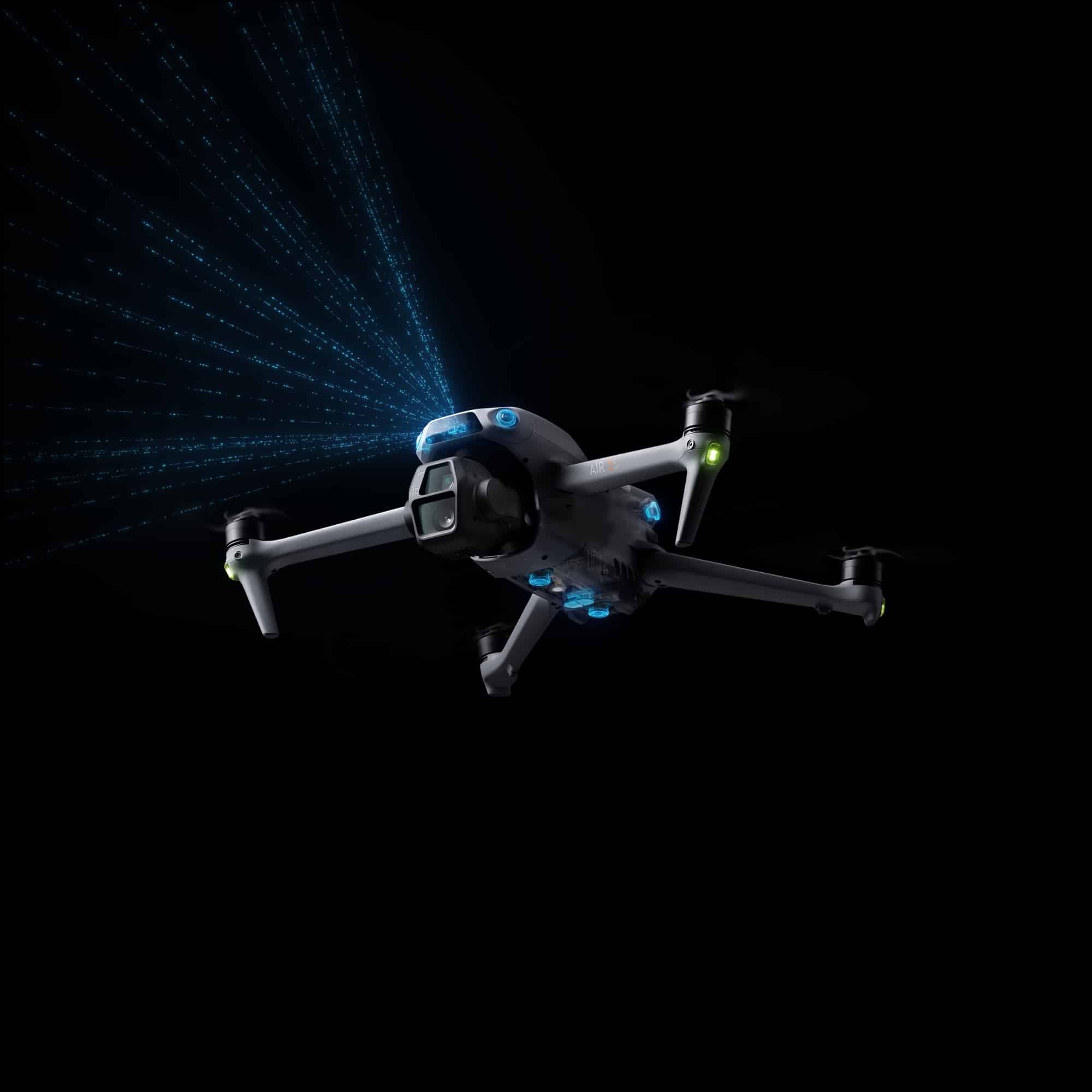 Studio render of the Air 3S casting blue LiDAR beams forward in darkness.