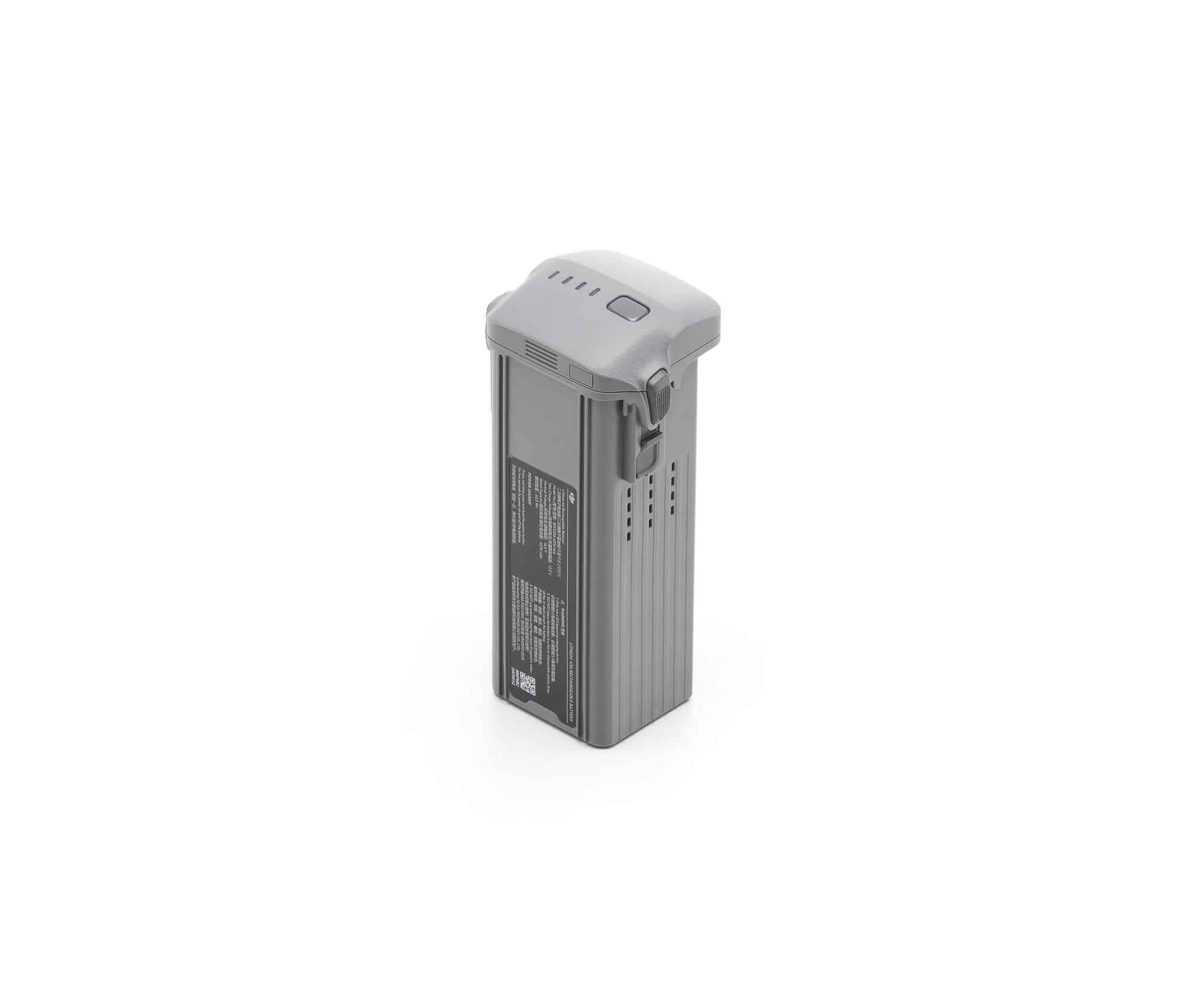 Intelligent Flight Battery standing on end with its contact terminals uppermost.