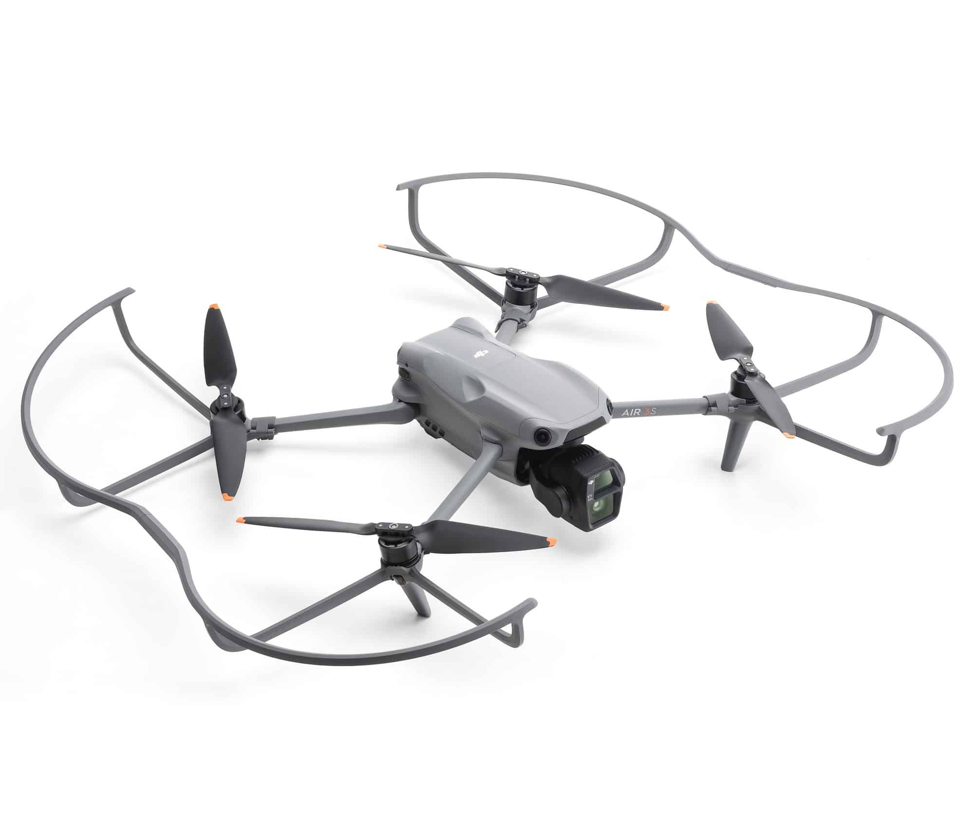 Air 3S fully enclosed by its four propeller guards on a white backdrop.