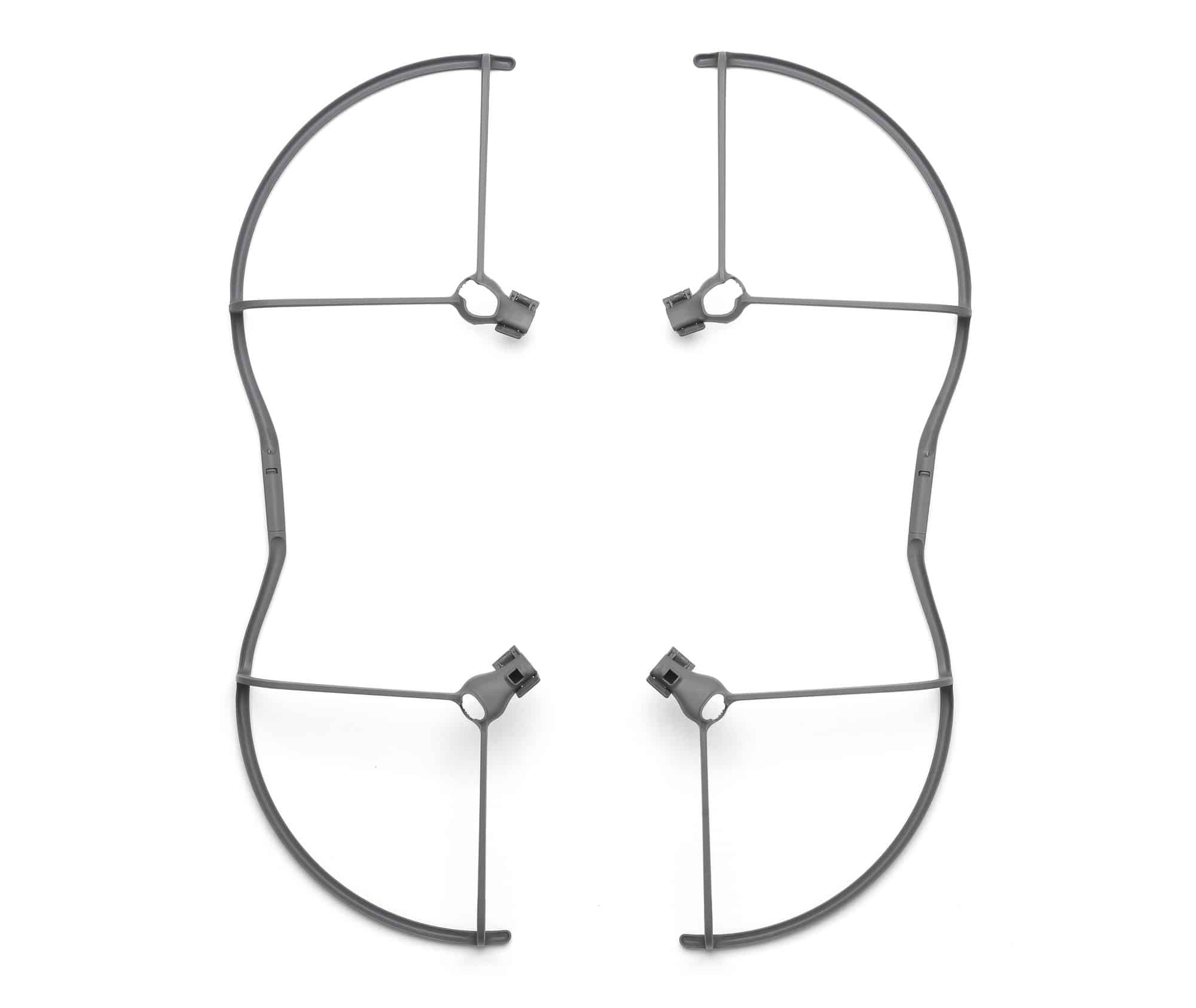 Four propeller guards laid flat in a symmetrical butterfly arrangement.