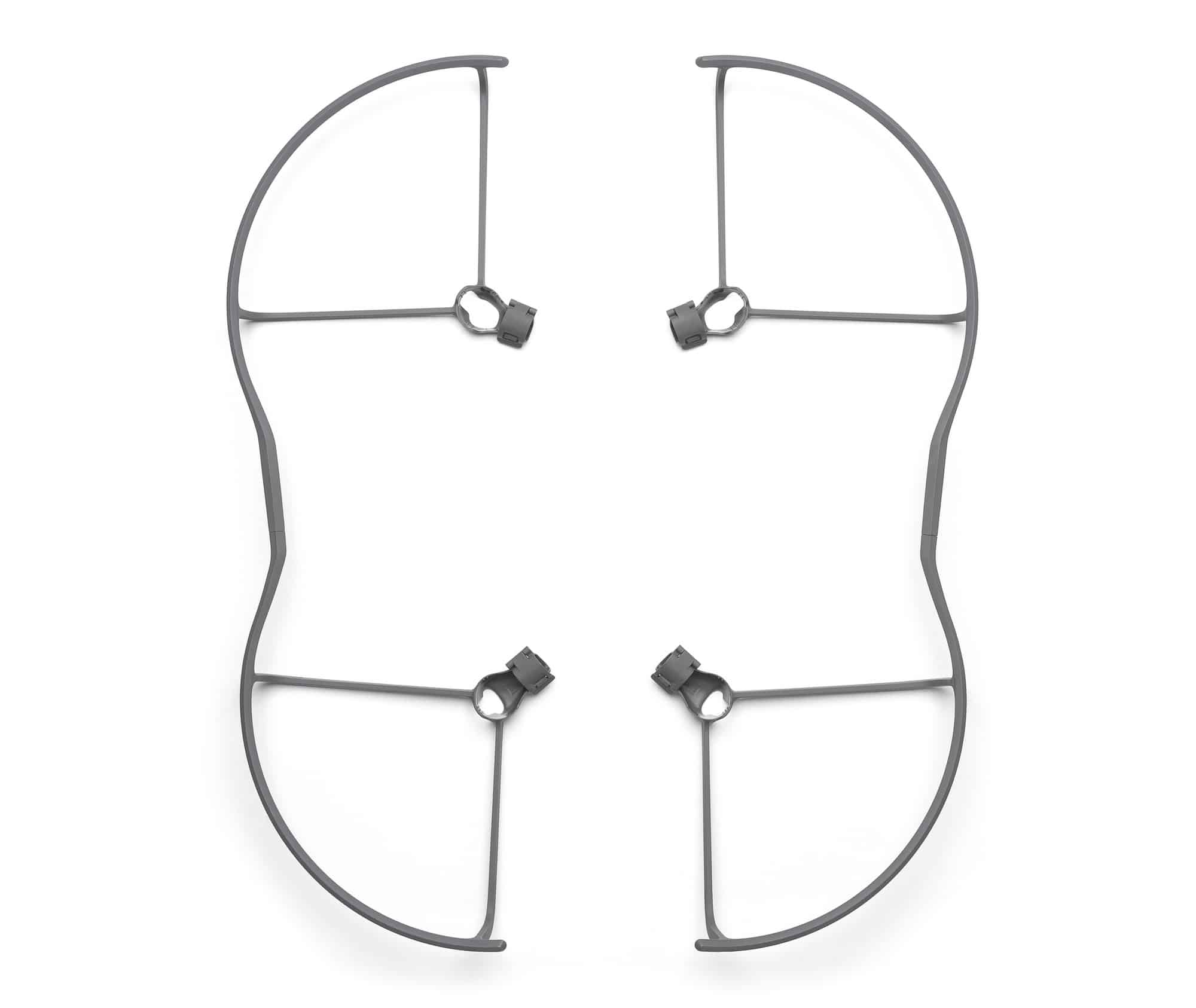 Overhead view of four propeller guard rings with their arm clips facing inward.