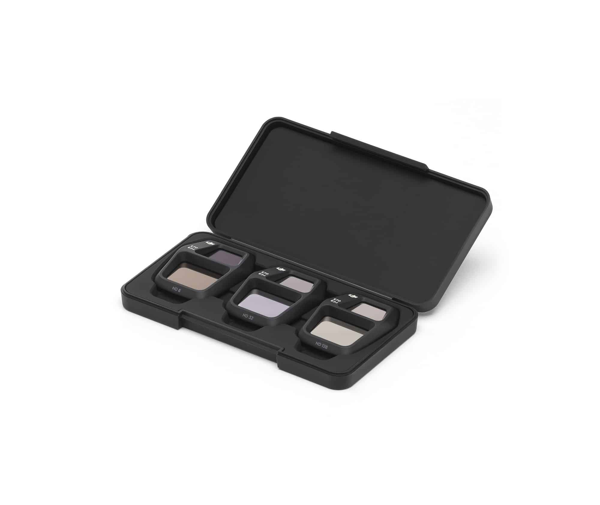 Filter case tilted open showing three seated ND filters from a low angle.