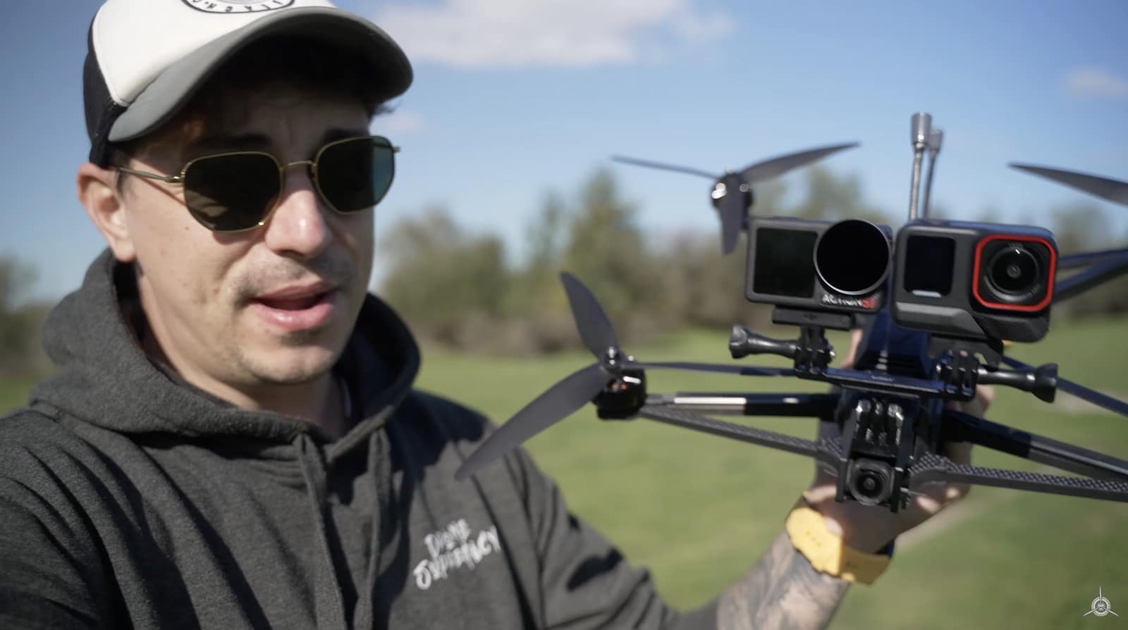 iFlight Helong 10 FPV drone carrying the Ace Pro 2 and Action 5 Pro at once.