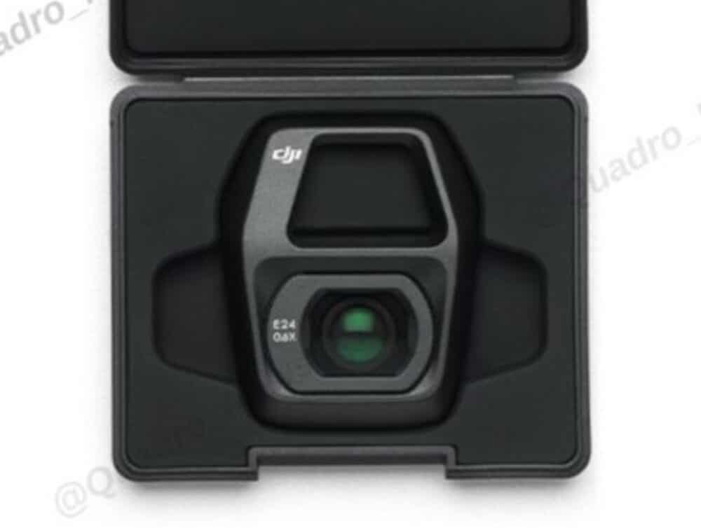 Snap-on wide-angle lens marked 0.6x sitting in its molded case.