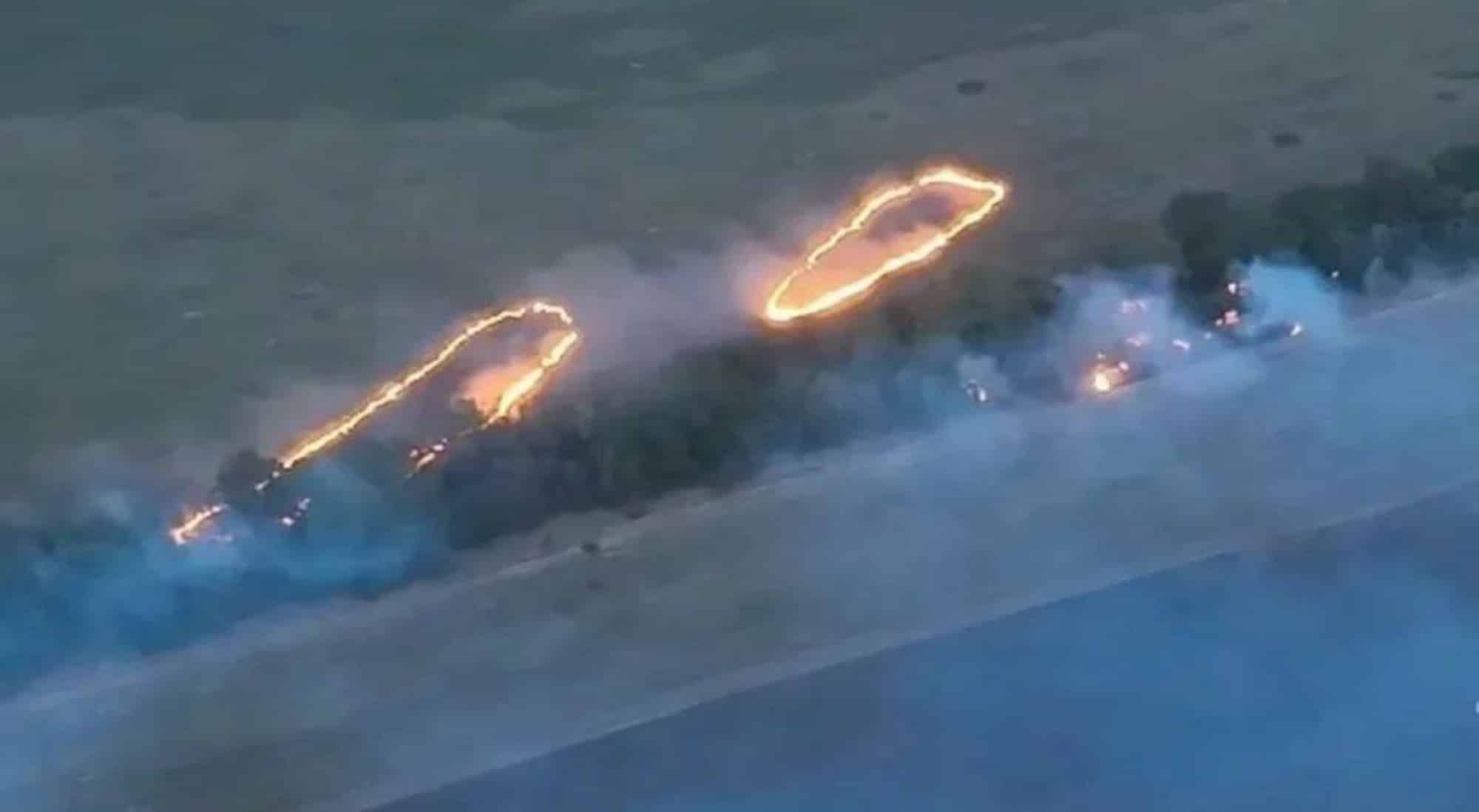 A Ukrainian dragon drone pouring molten thermite over a Russian-held tree line.