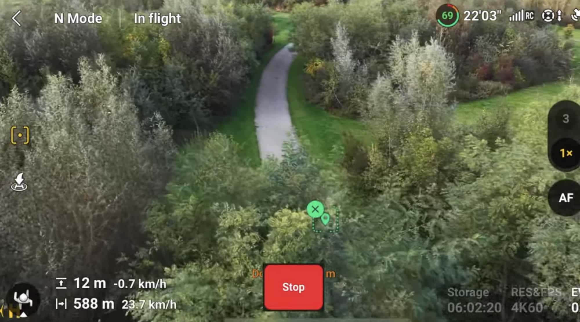 The Air 3S trailing the rider across open ground dotted with low bushes.