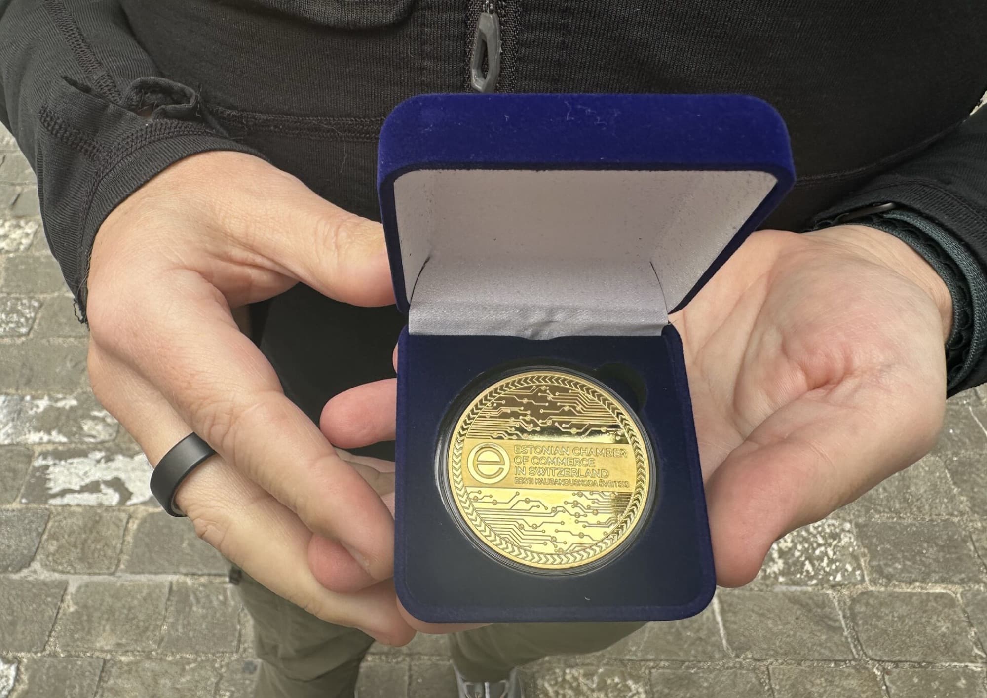 The Estonian Chamber of Commerce Golden Medal in its blue presentation case.