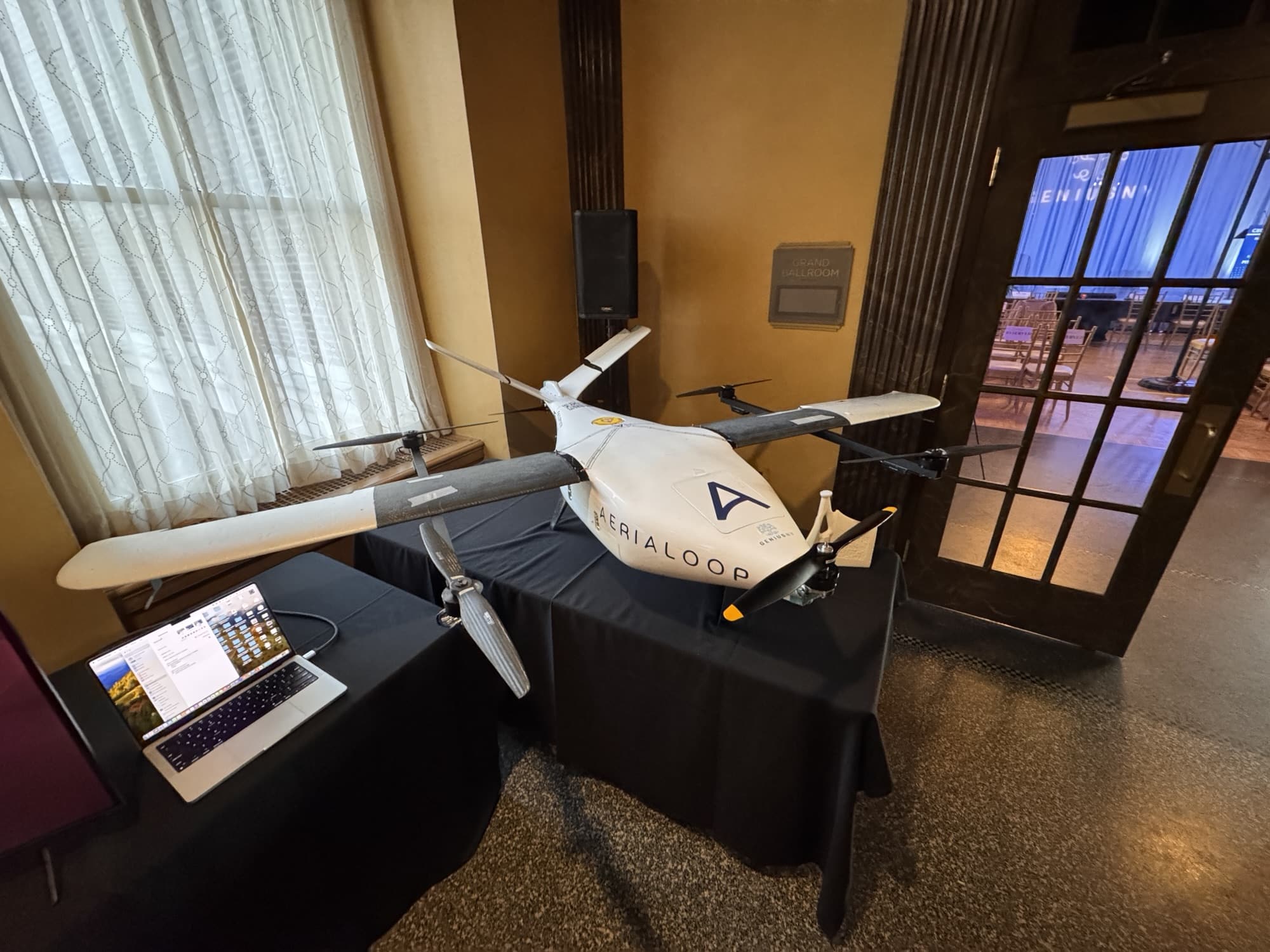 An Aerialoop delivery aircraft shown during the Miami startup pitch.