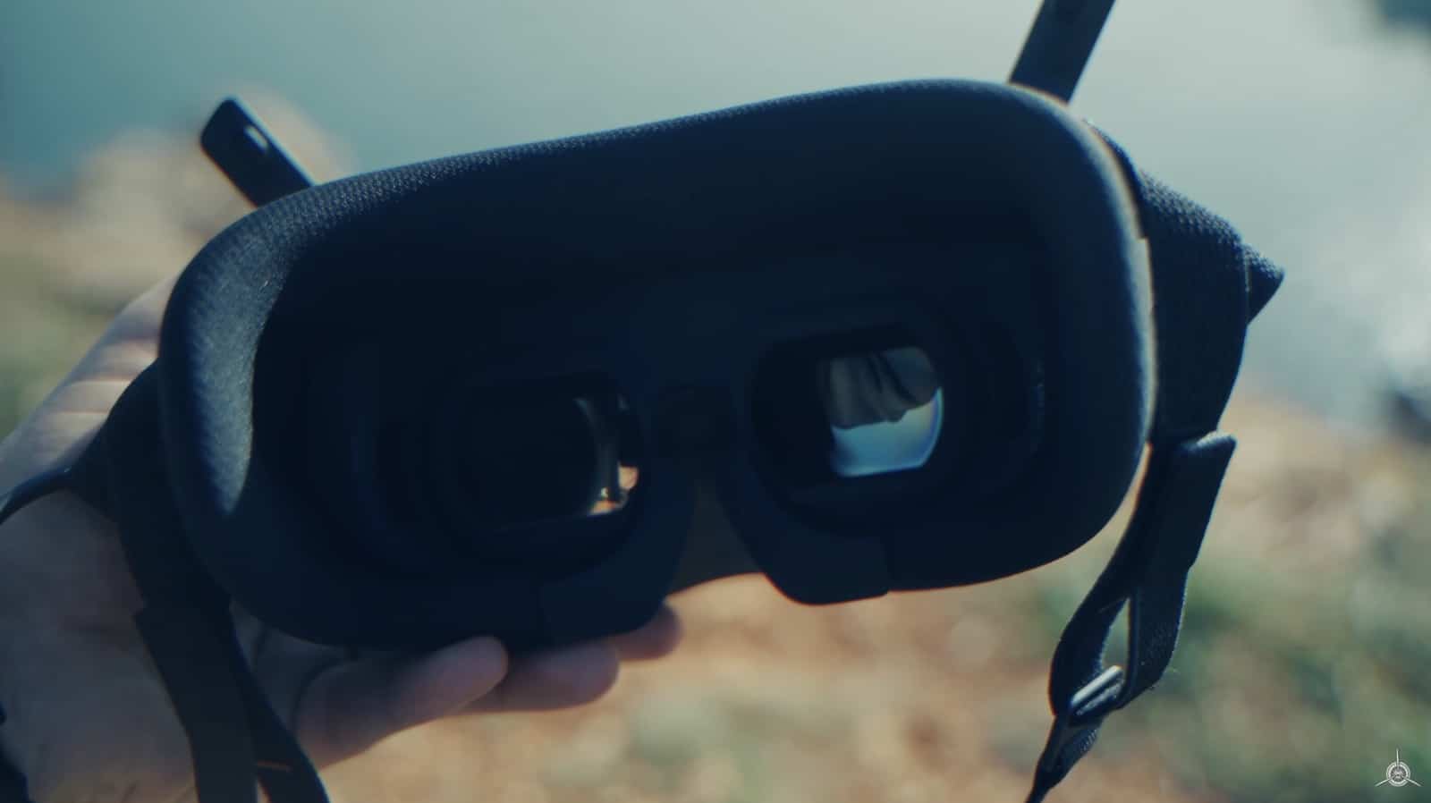 Hand holding the Goggles N3 to show the thick face foam and twin lenses.