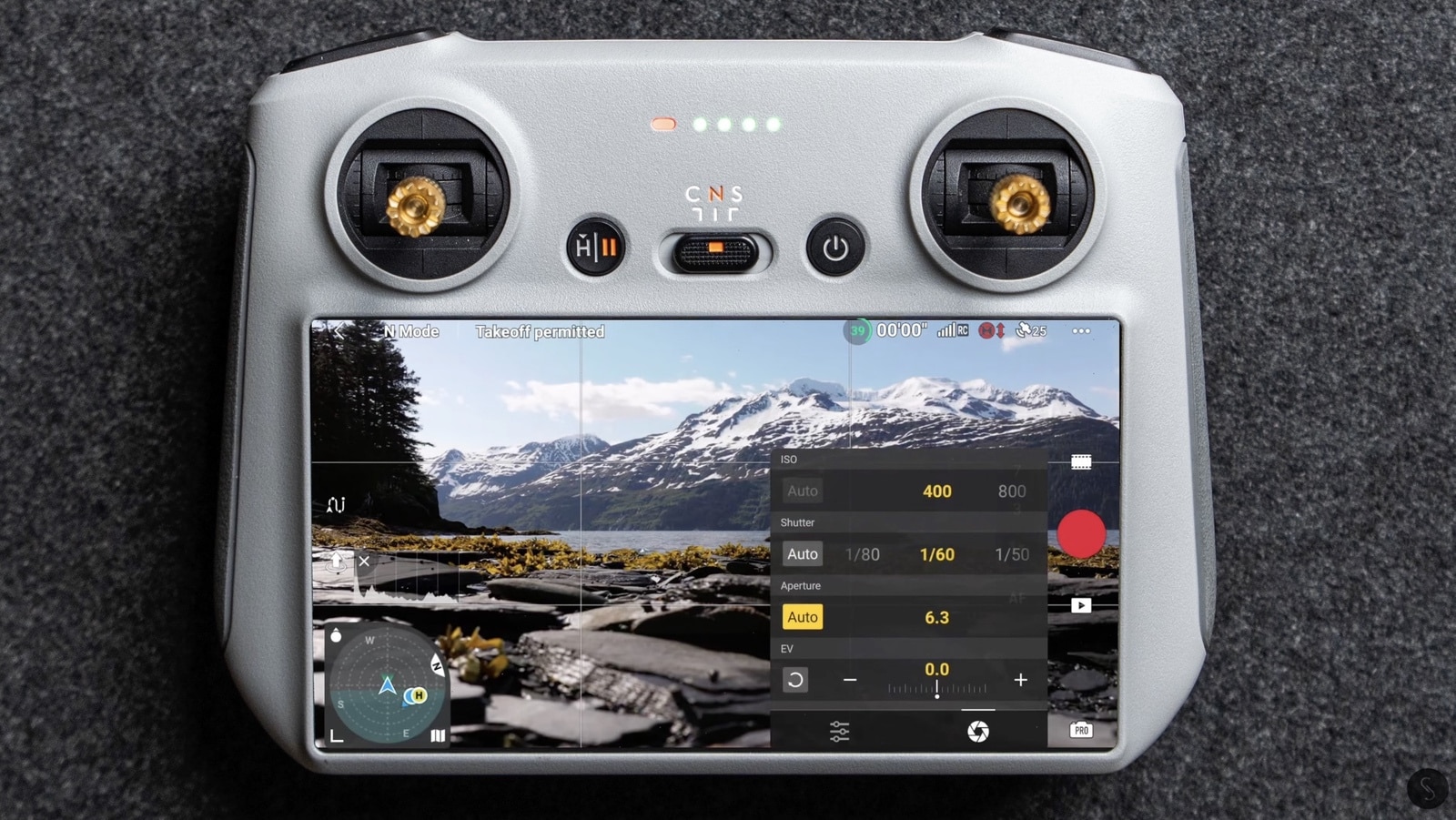 Screenshot of the ISO, shutter speed and aperture controls behind the shutter icon.