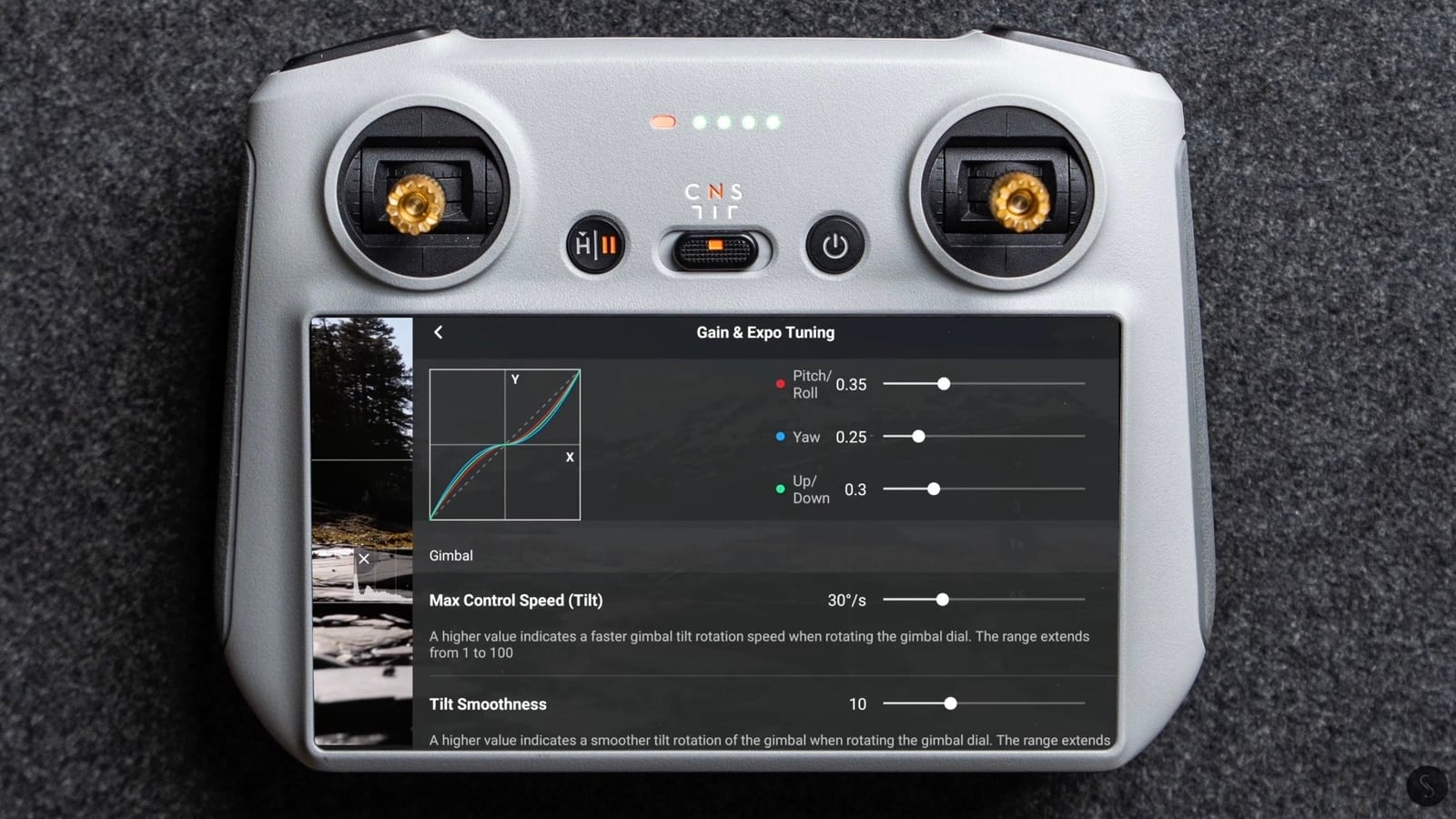 Gain and Expo Tuning page showing pitch, yaw and tilt sensitivity sliders.