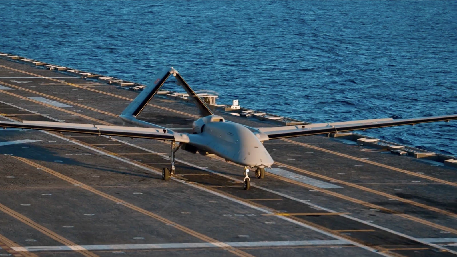 The TB3 on approach to the short deck, landing without arresting equipment.