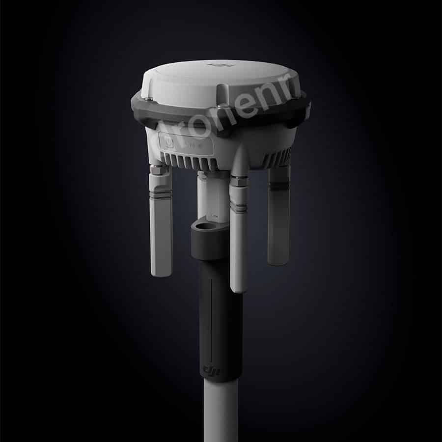 Render of the D-RTK 3 base station mounted on a survey pole with antennas.