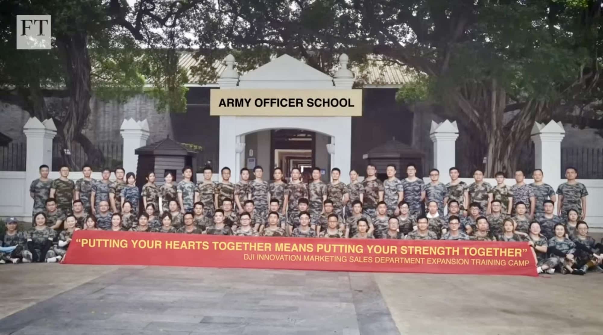 Photographs of DJI executives at a Chinese military training facility, cited by critics.