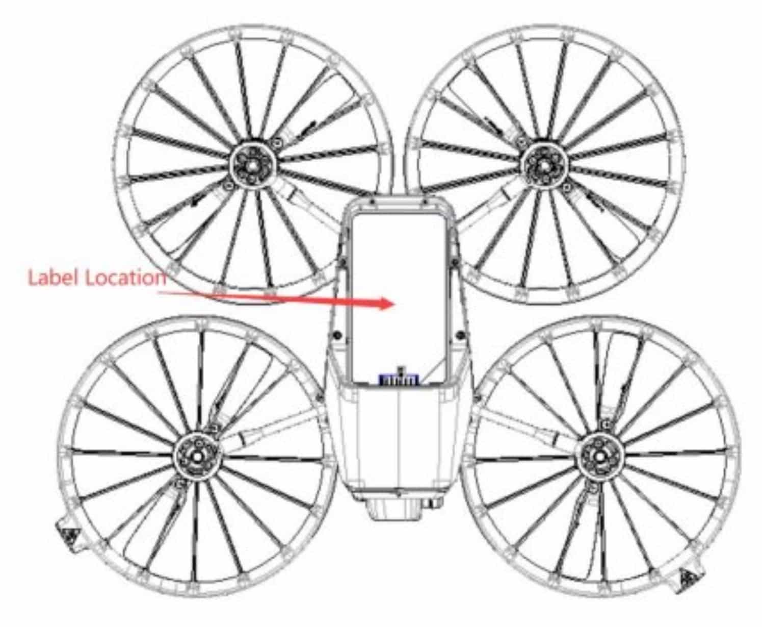 Regulatory filing drawing of a caged quadcopter with an arrow marking the label location.