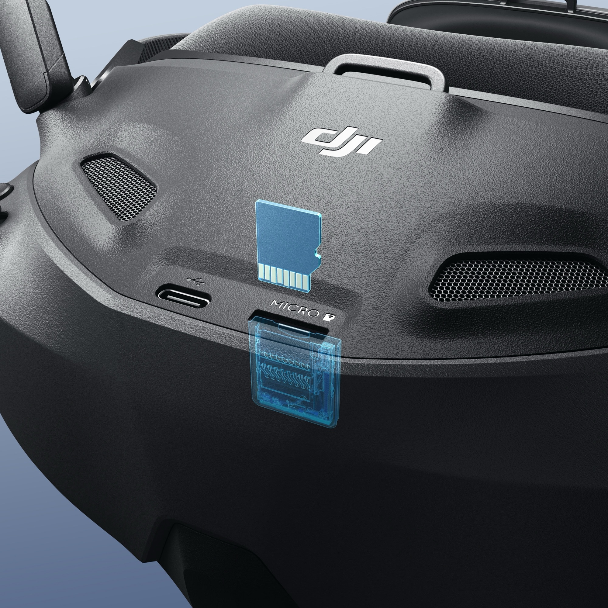 Close-up of the goggles underside with the USB-C port and microSD slot highlighted.
