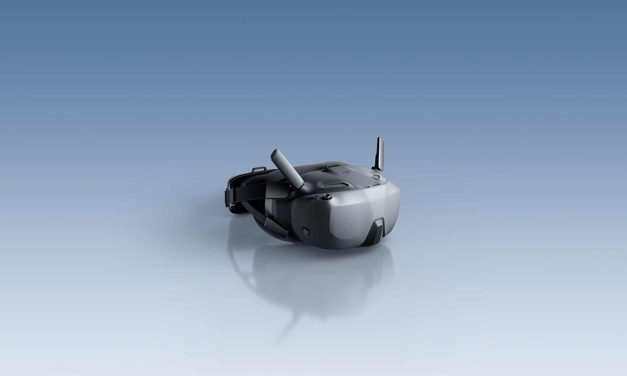 Product render of the DJI Goggles N3 resting on a pale gradient surface.