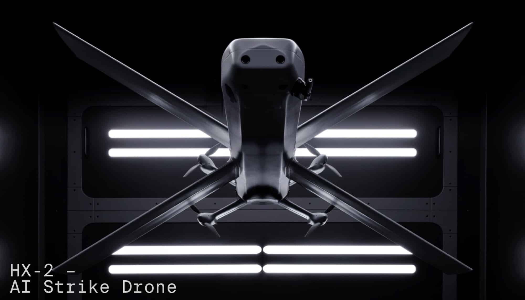 Helsing HX-2 strike drone displayed on a lit stand with its name below.