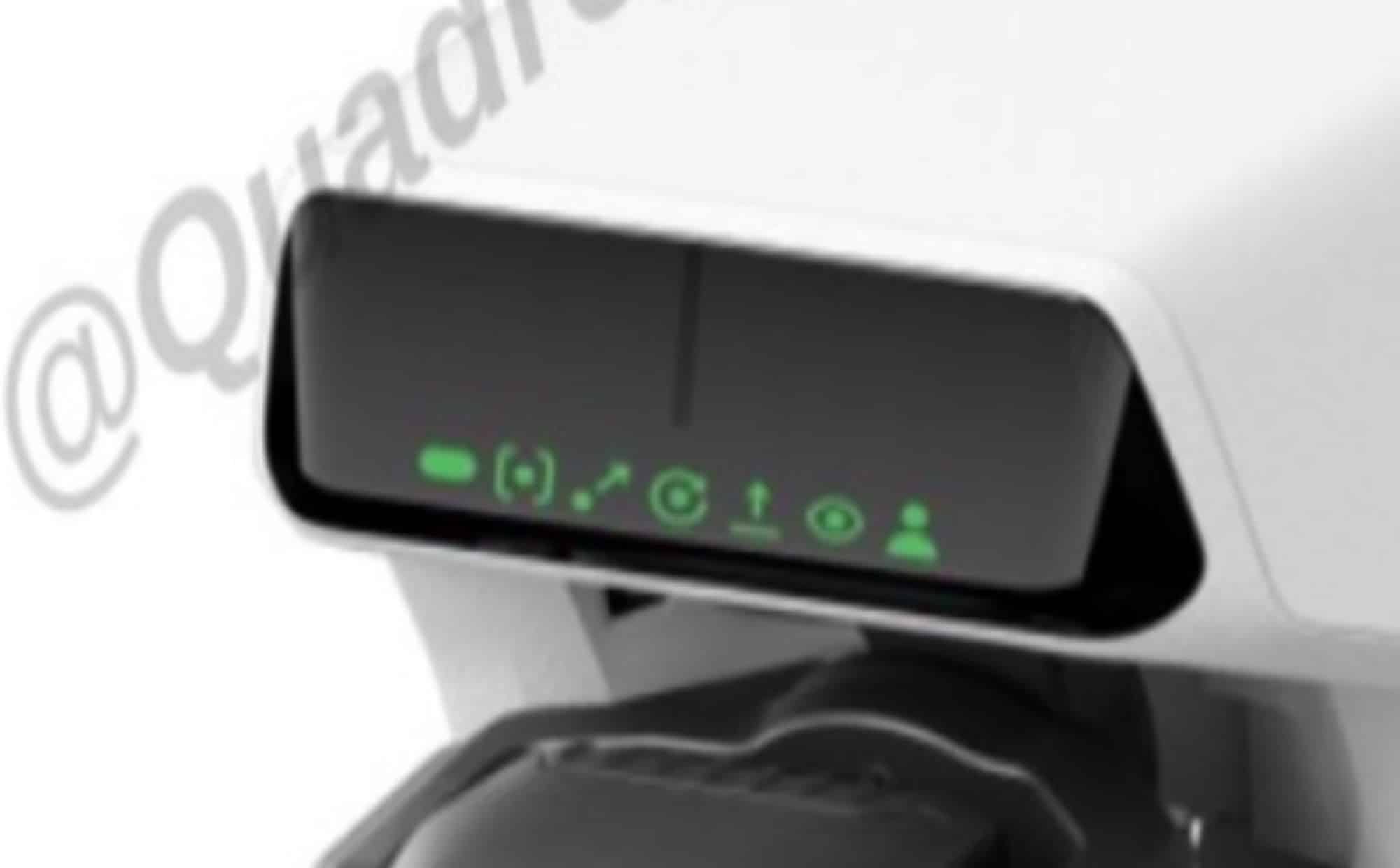 Close-up of the Flip top status screen showing green QuickShot mode icons.