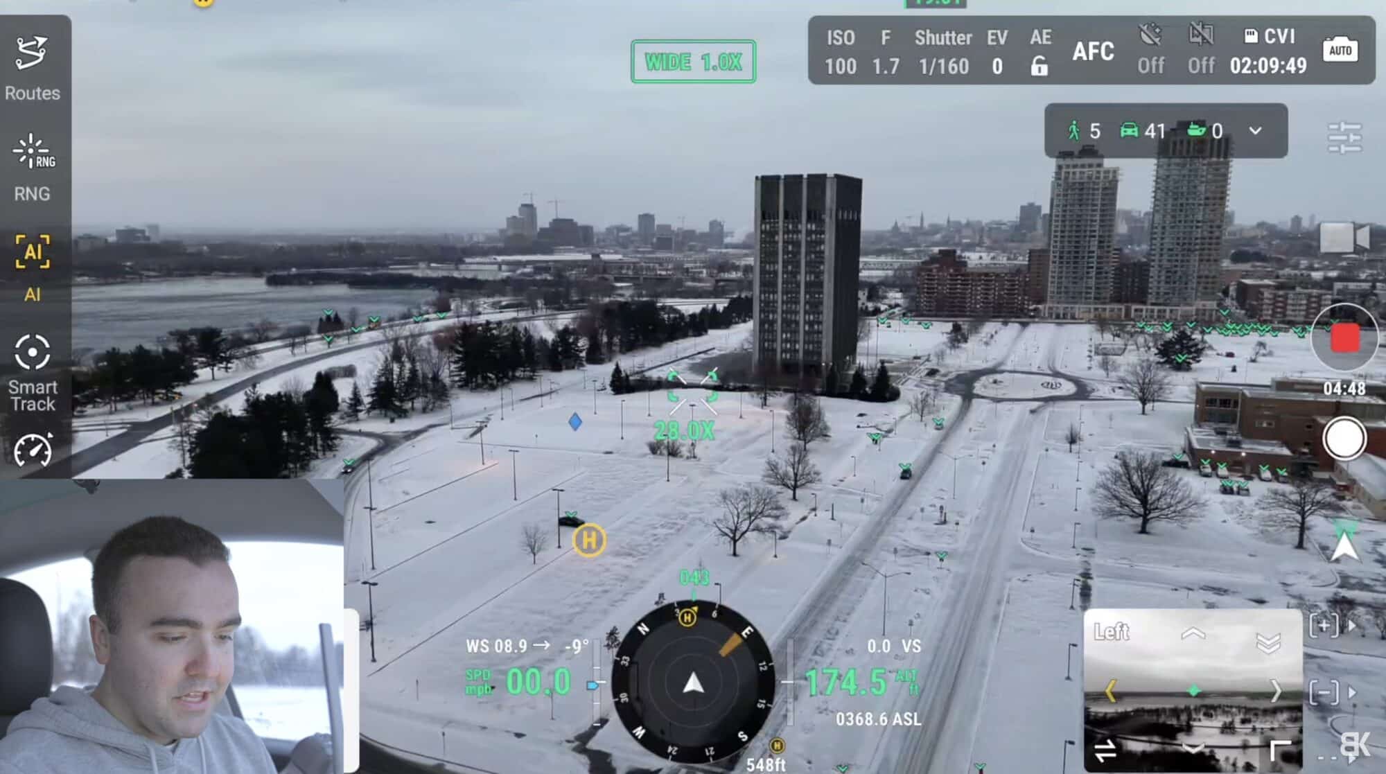 DJI Pilot screen marking people and vehicles with AI boxes over a snowy waterfront.