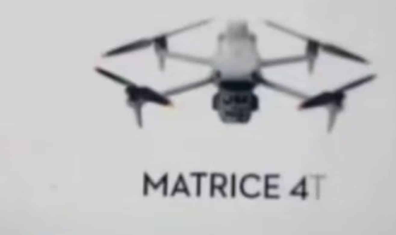 Blurry leaked frame of a grey quadcopter labeled Matrice 4T with a multi-sensor gimbal.