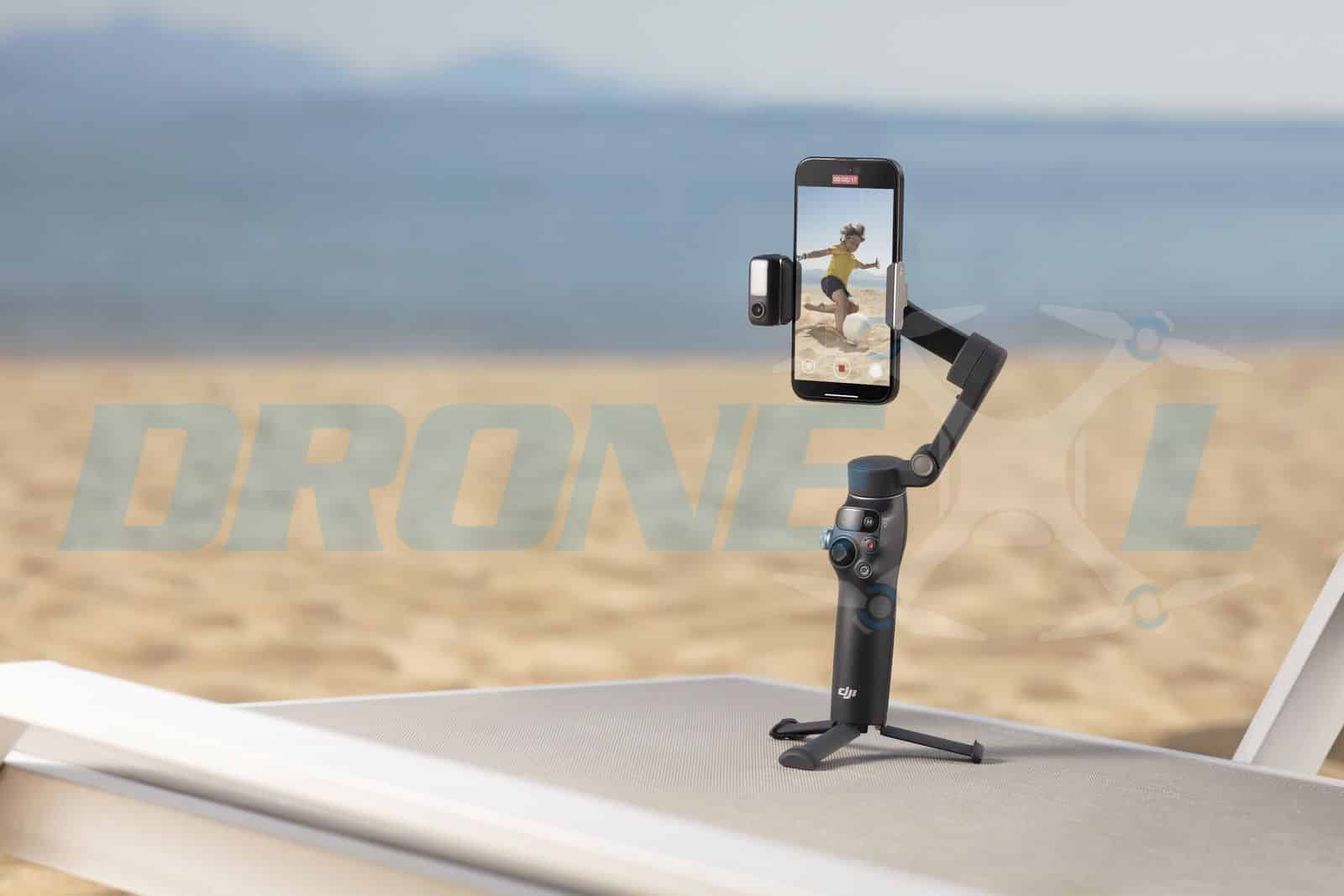 The dark grey Osmo Mobile 7 Pro with its subject tracking camera and fill light.