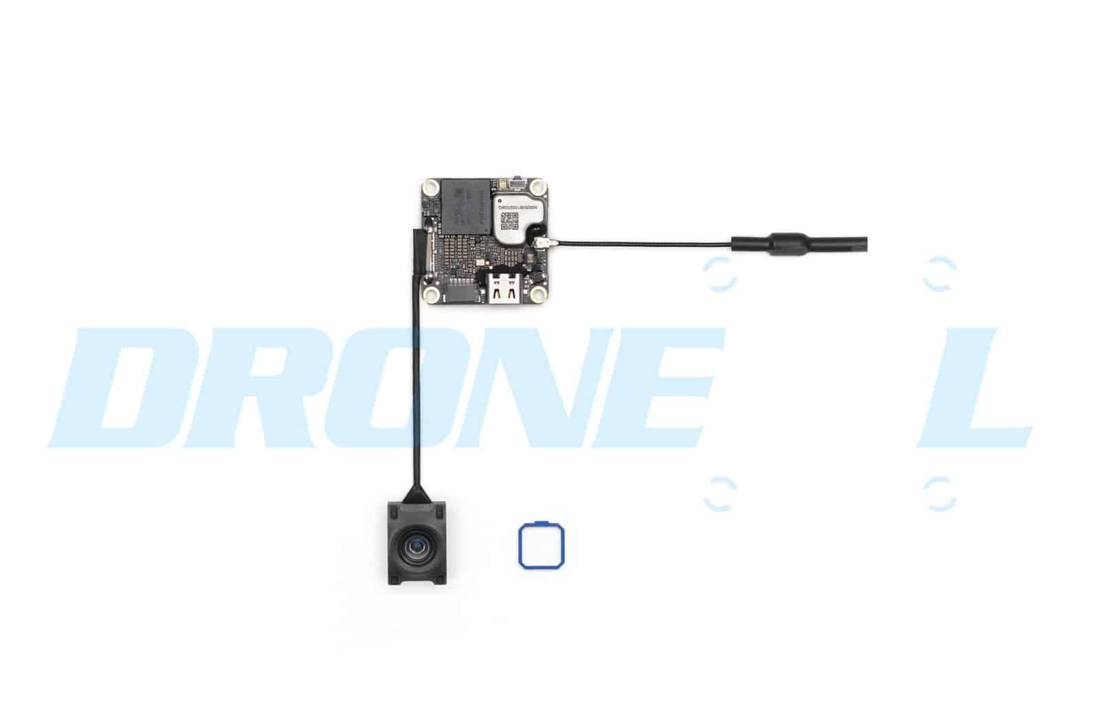 The mainboard, antenna and lens module shown without the ribbon cable attached.
