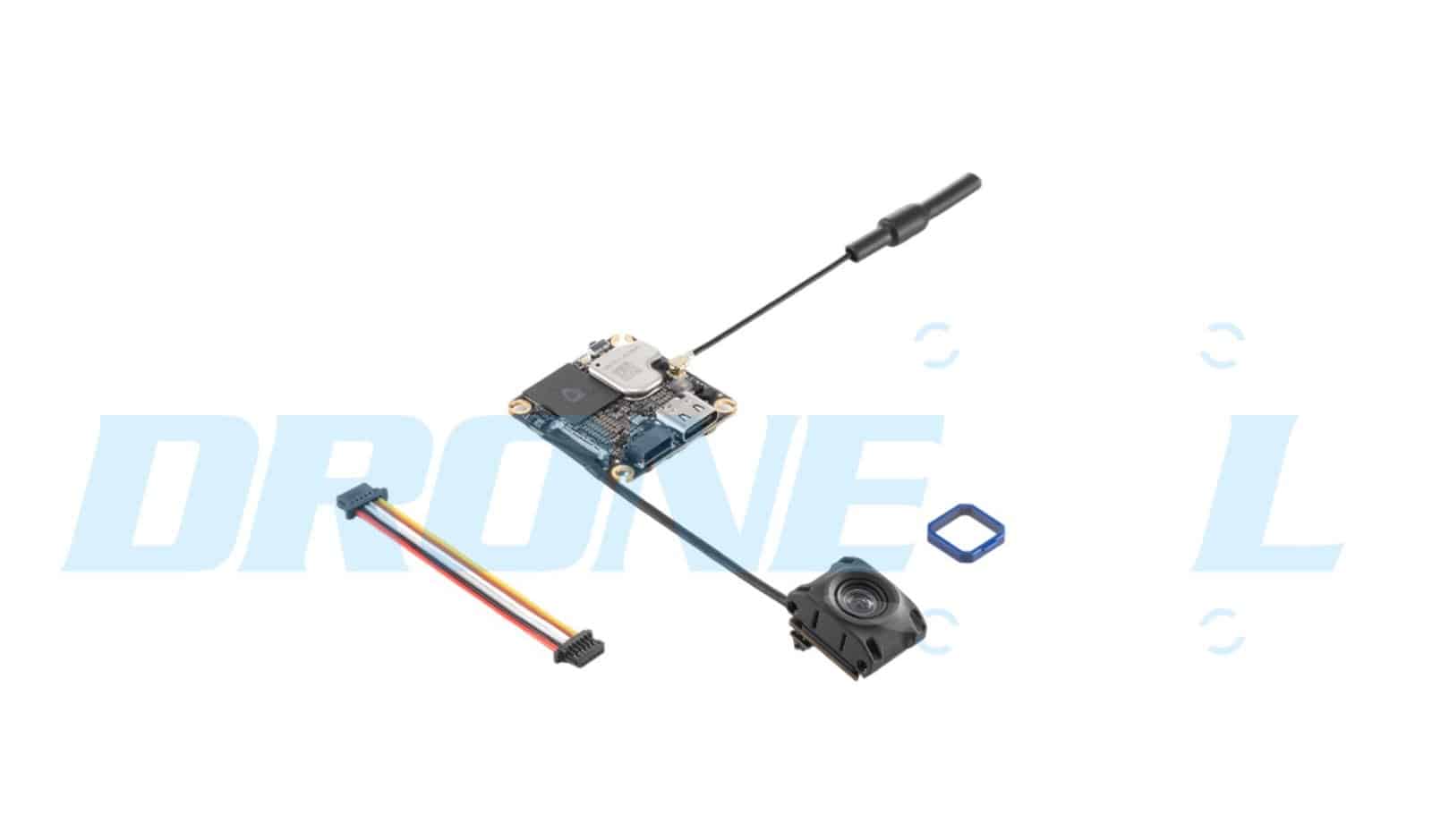 Internal parts spread out: ribbon cable, mainboard, antenna, camera unit and gasket.
