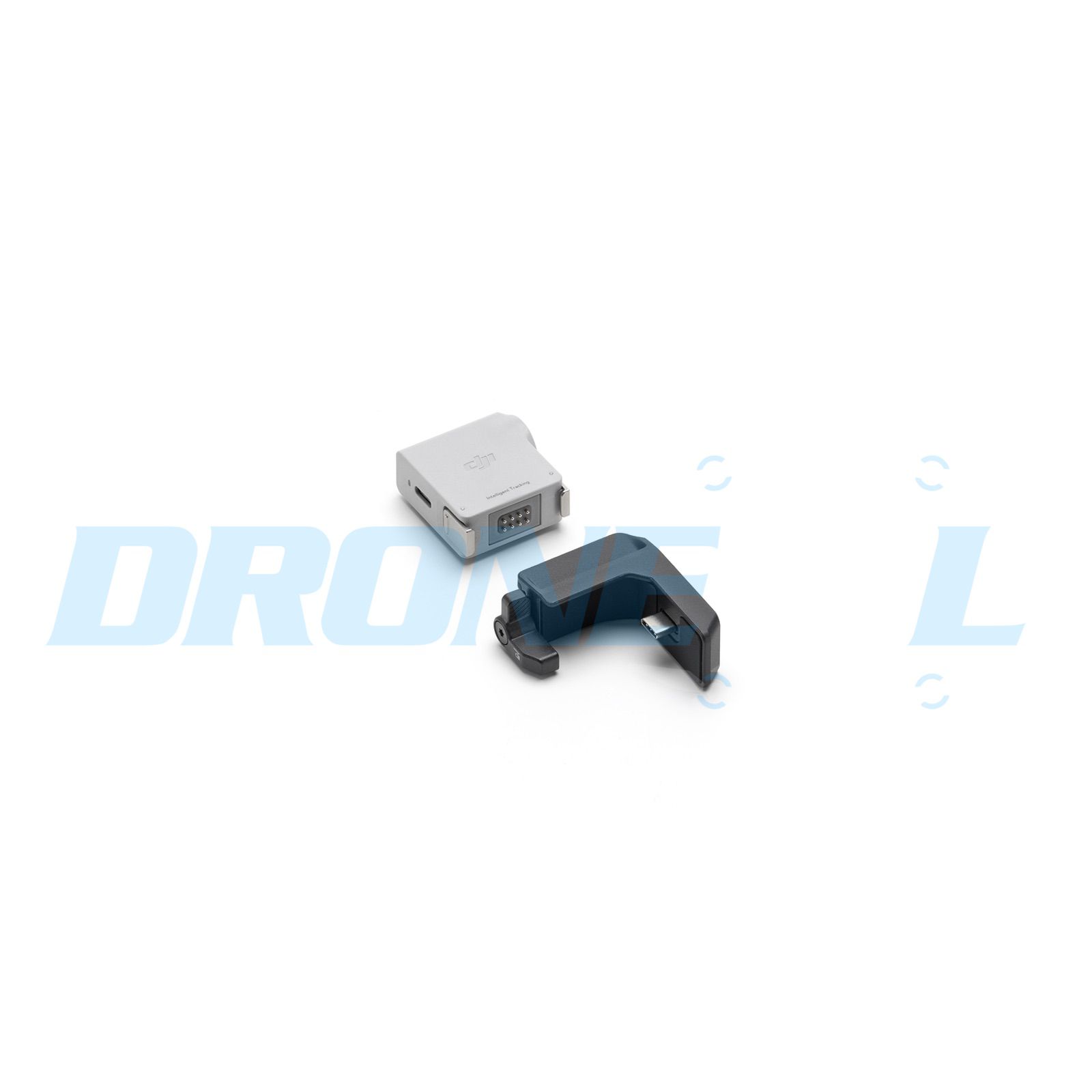The tracking module laid flat next to the bracket, port and contacts visible.