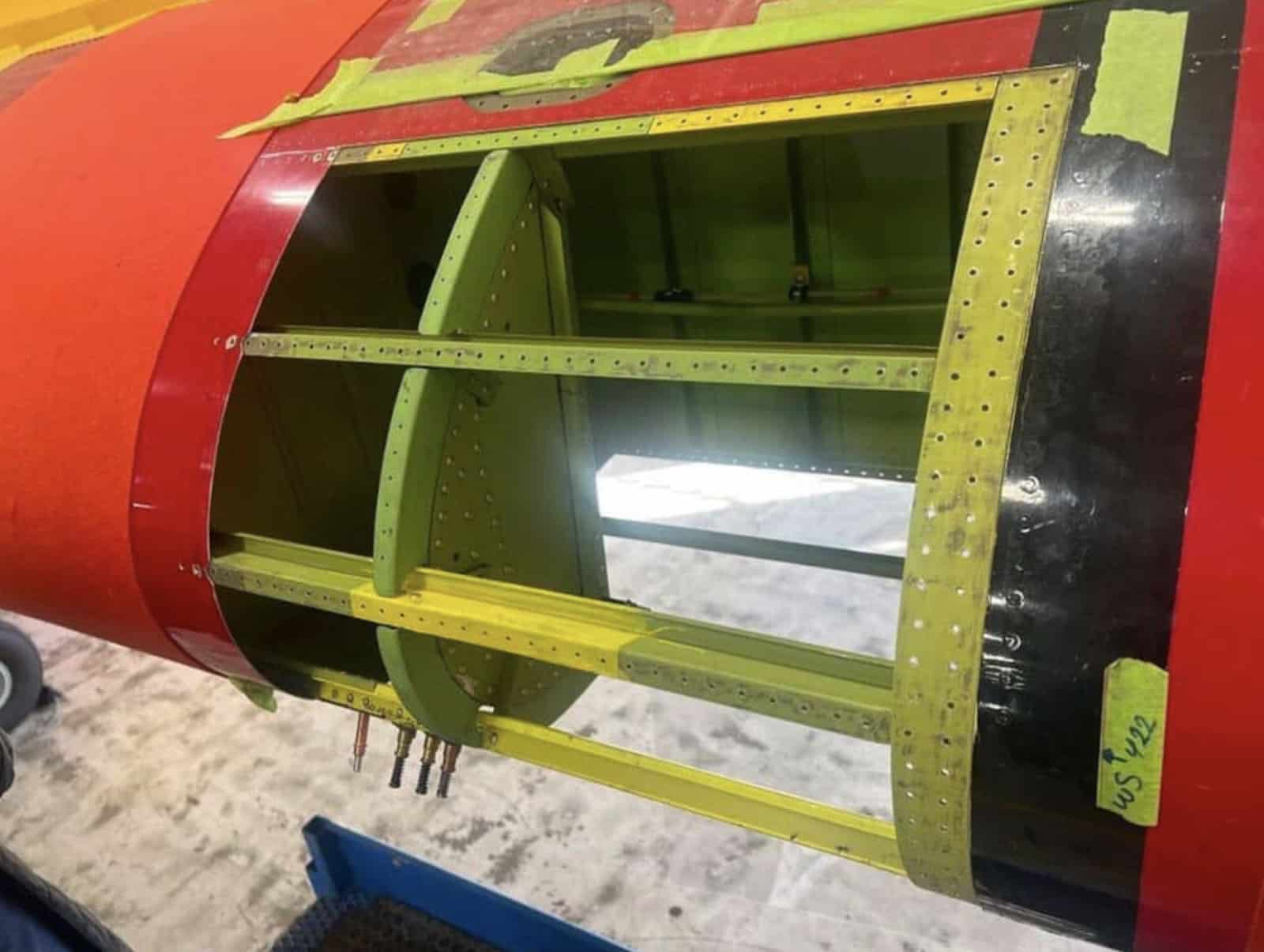 The opened wing leading edge revealing the internal rib bays and spars.