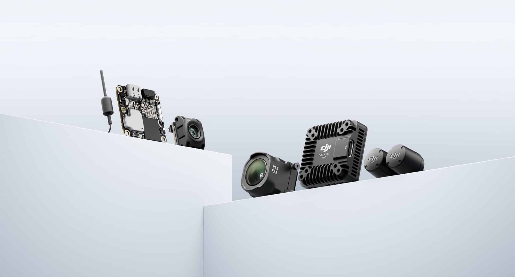 The compact O4 Air Unit and the larger Pro module displayed with their cameras and antennas.