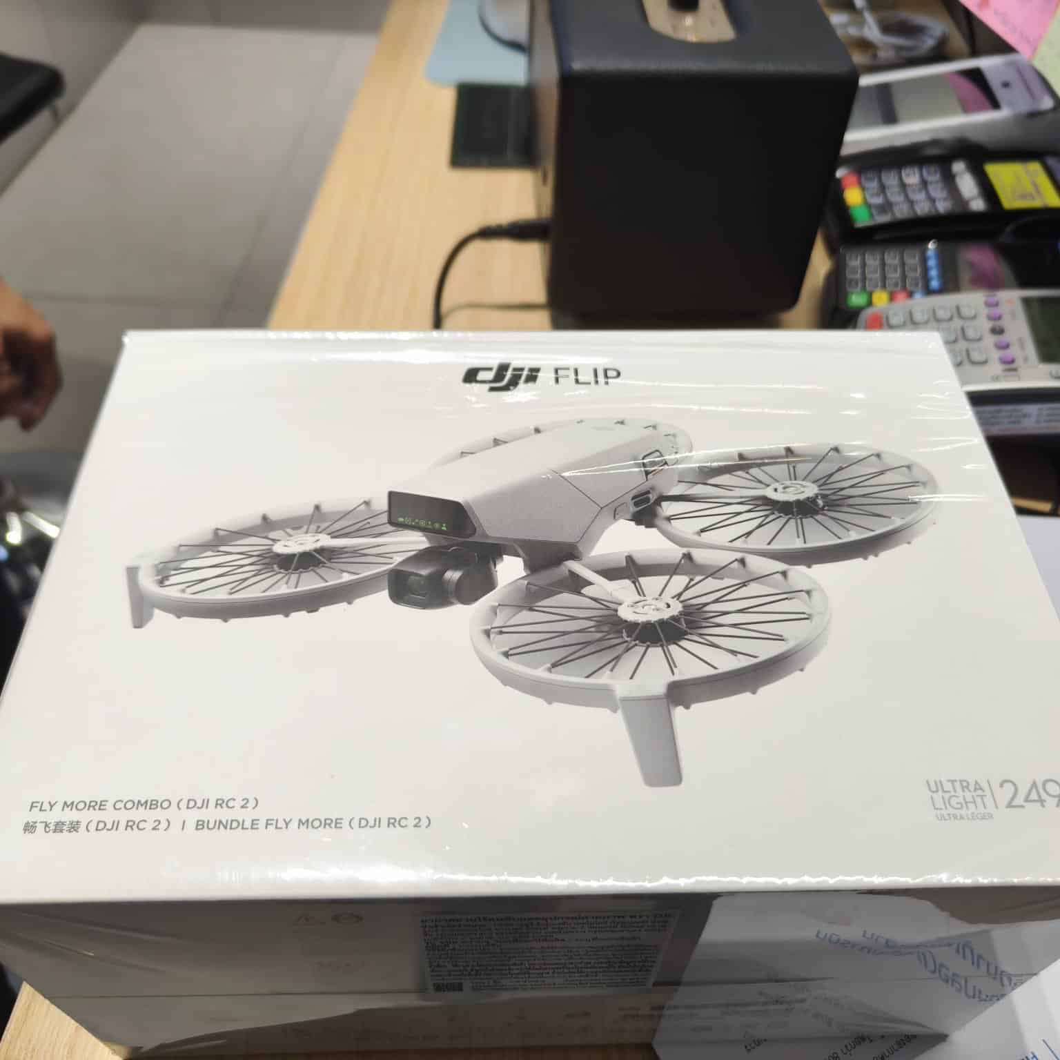 Retail box for the Flip Fly More Combo sitting on a shop counter.
