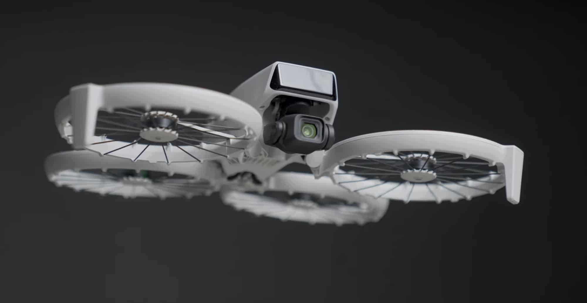 DJI Flip against a dark backdrop with its camera and propeller cages exposed.