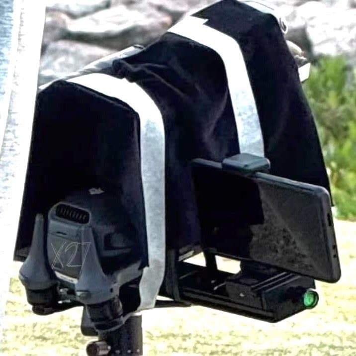 Rear view of the covered rig showing the unreleased drone's exposed heat sink.