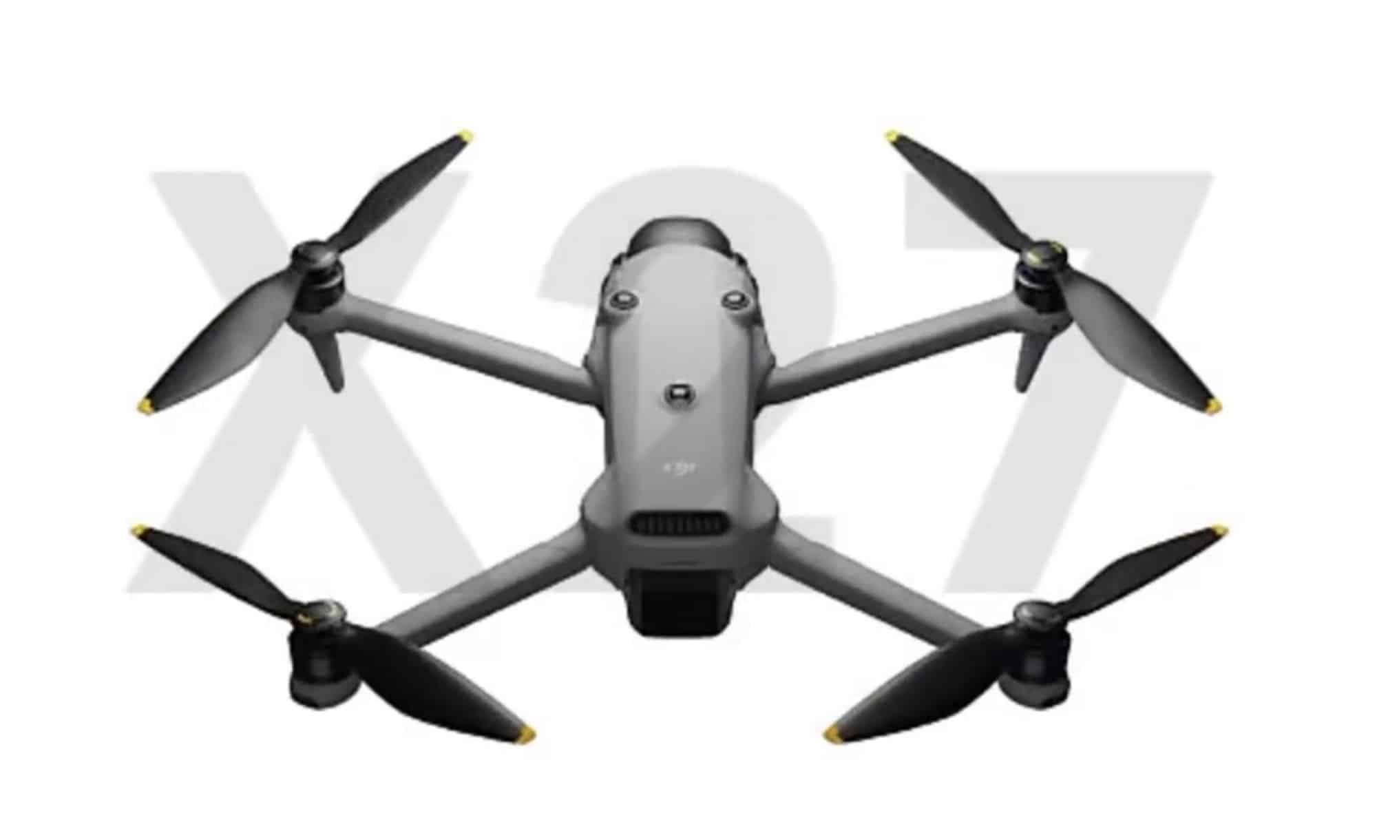Top-down render of the grey folding quadcopter over an X27 leak watermark.