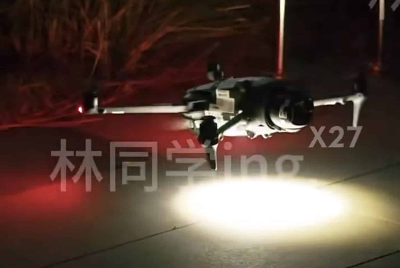Night leak footage of a Mavic 4 Pro hovering above a bright floodlight.