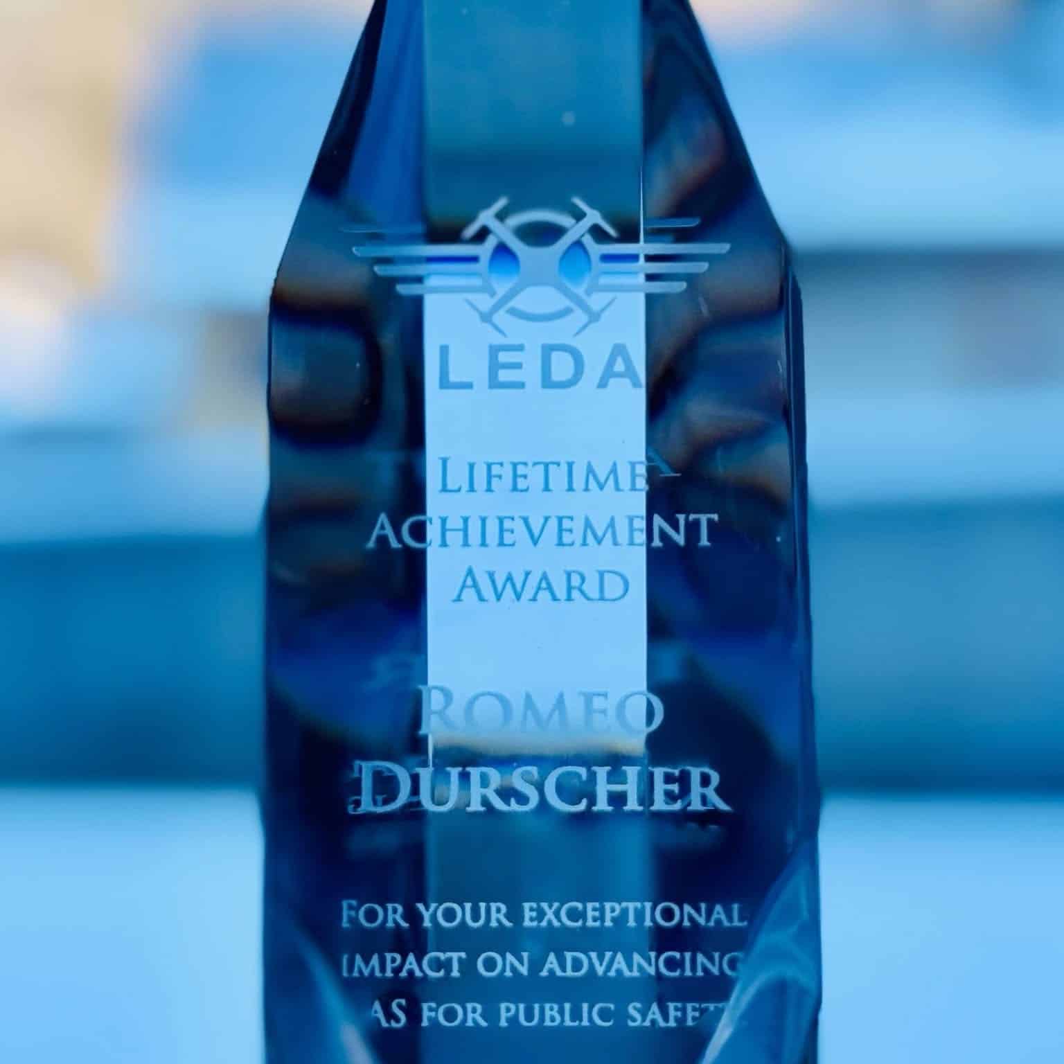 Close-up of the engraved LEDA Lifetime Achievement Award trophy for Romeo Durscher.