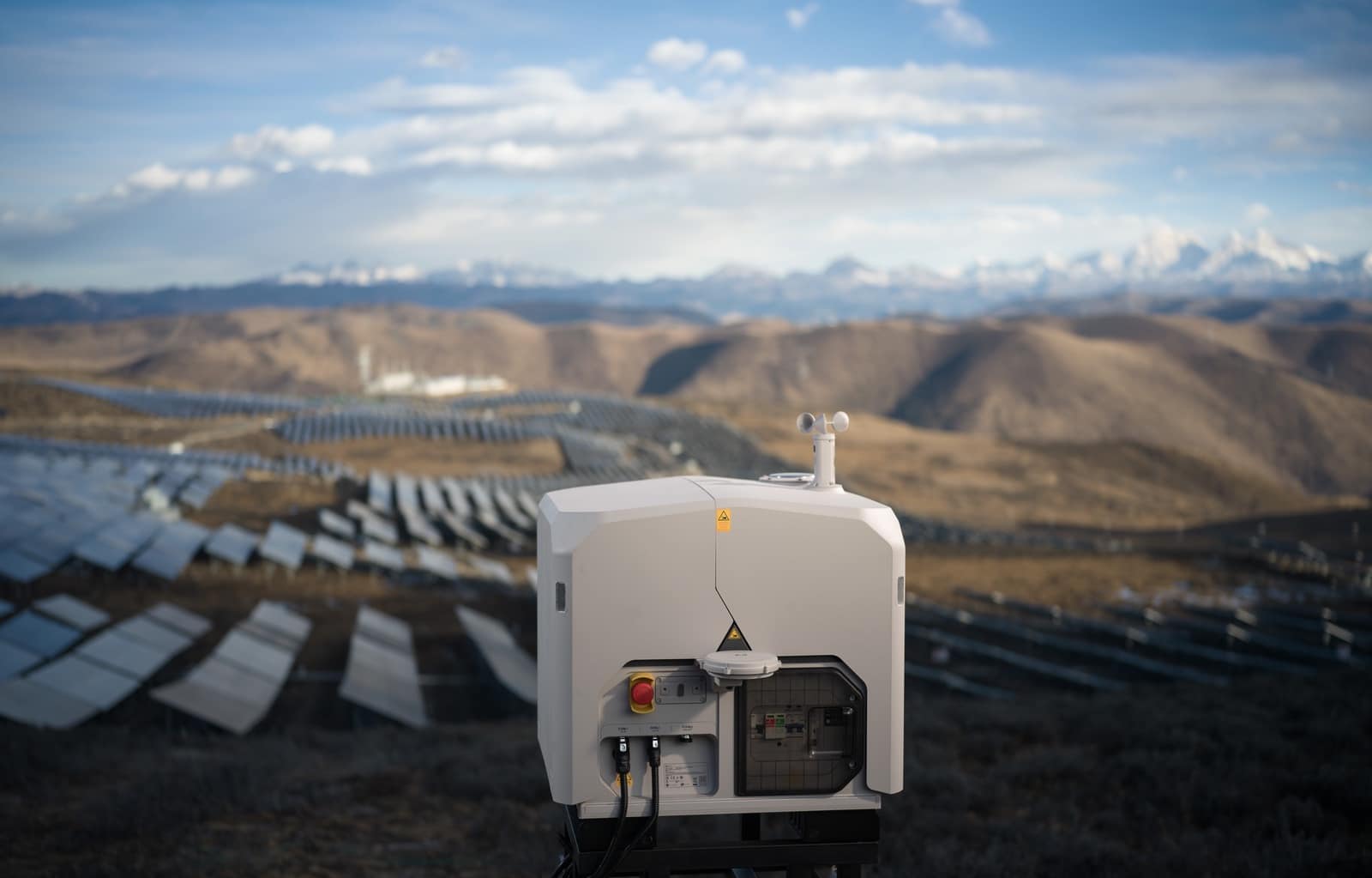 Dock installed at the upper edge of a large solar farm in dry hills.