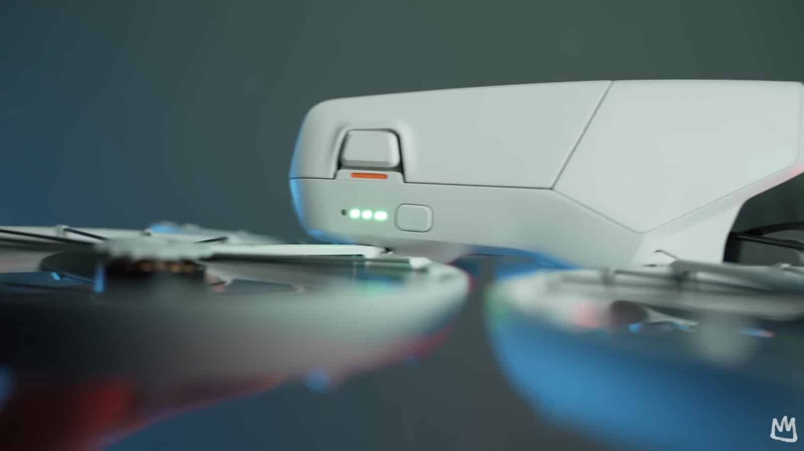 Close macro of the DJI Flip with three green battery lights lit.