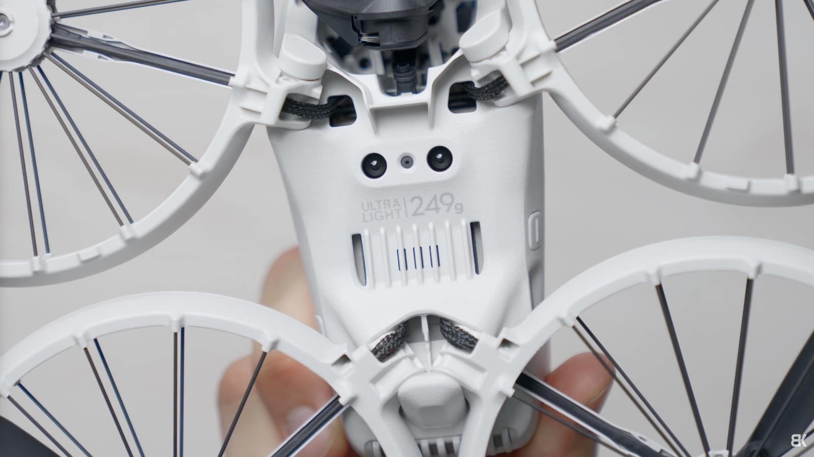Underside of the DJI Flip inside its propeller cages, marked ultra light 249 g.