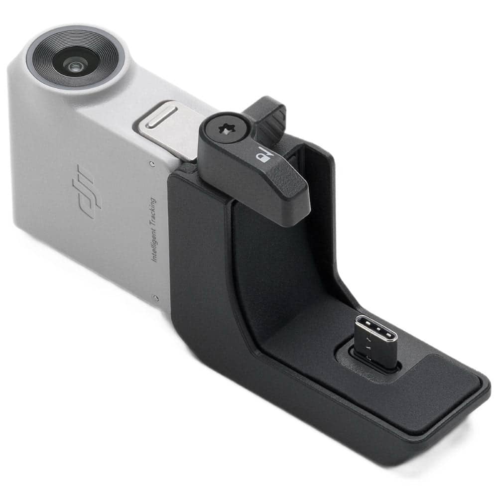 Product render of the tracking module seated in its bracket, lens facing forward.