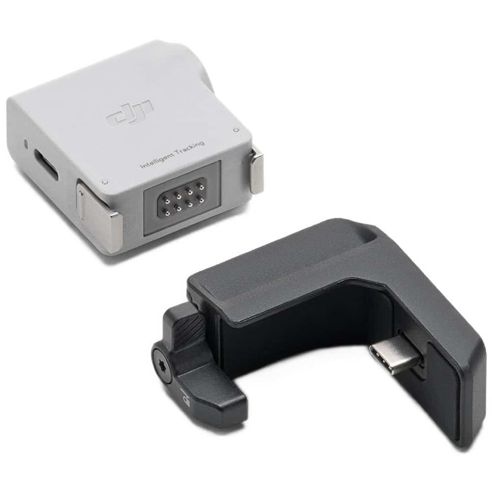 The white Intelligent Tracking Module beside its black L-shaped mounting bracket.