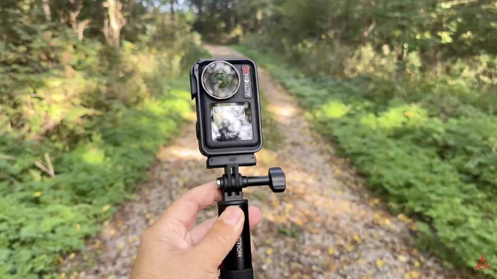 The DJI Action 5 Pro turned sideways in its included case for vertical 4K social video.