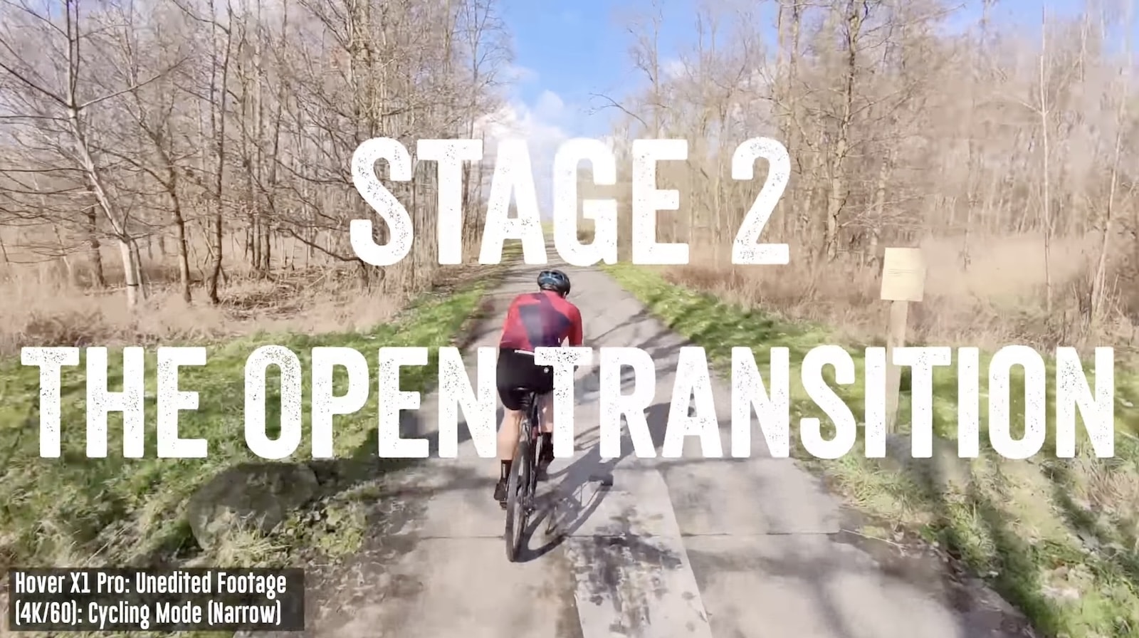 Stage 2 card as the rider leaves the woods onto an open lane.