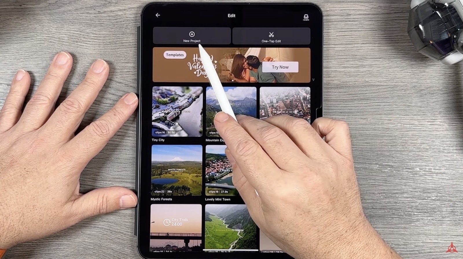 Hands tapping template thumbnails in the DJI Fly editor on a tablet.