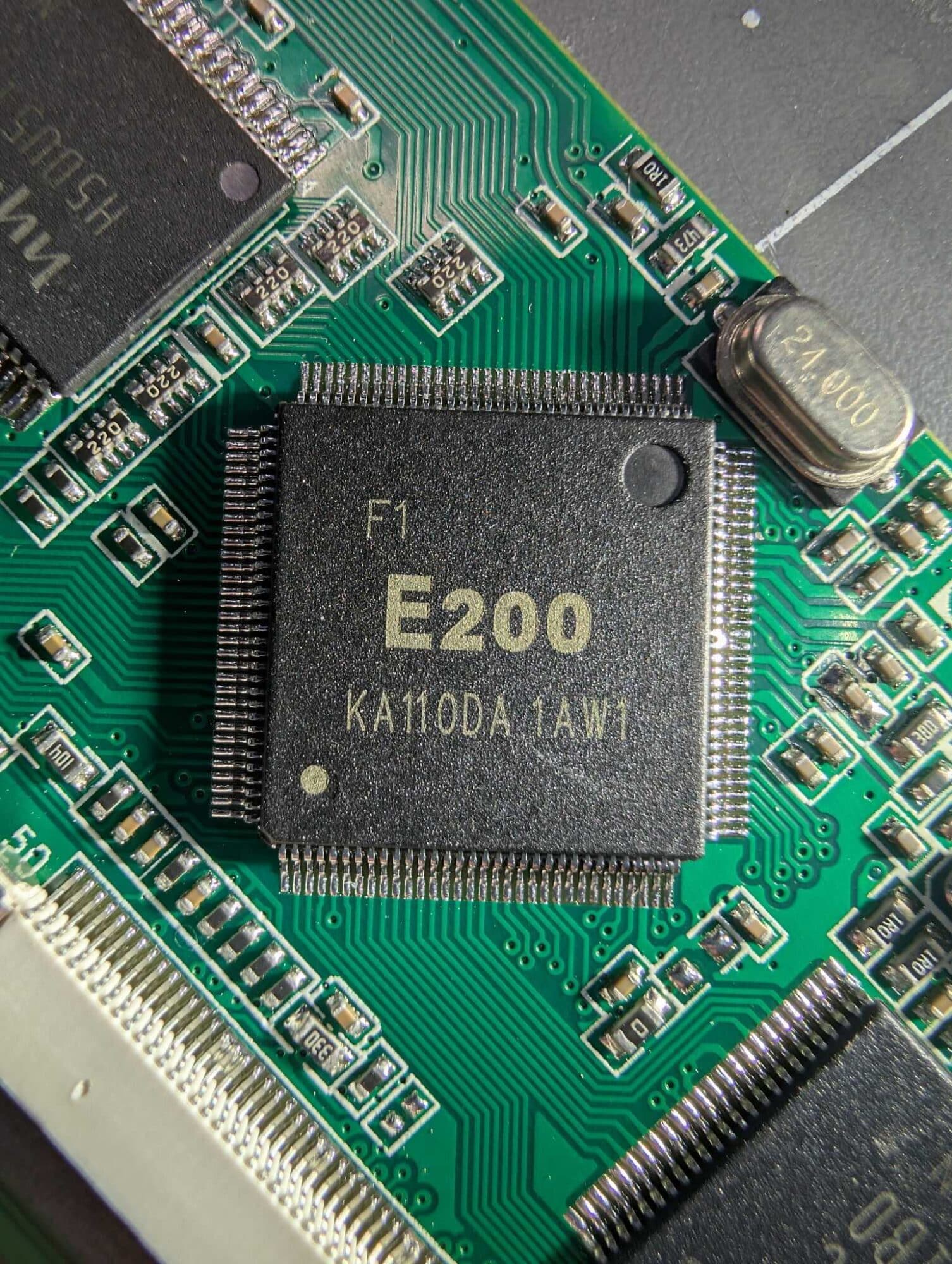 A square E200 controller chip and crystal oscillator on the board.