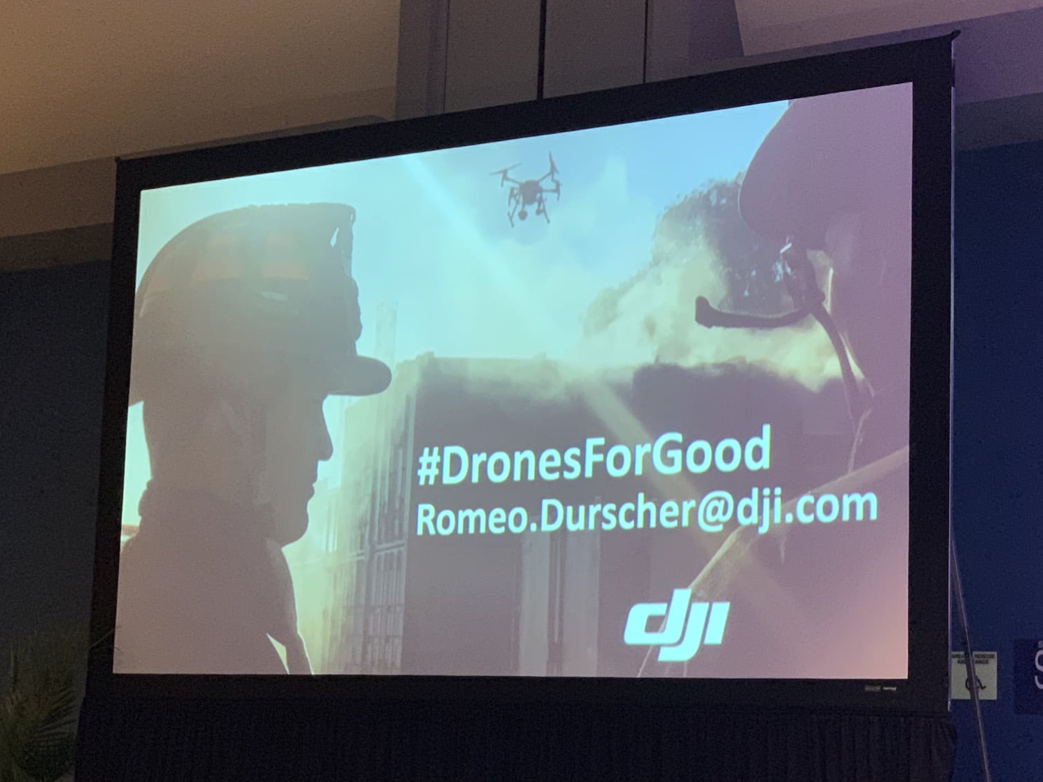 Presentation slide promoting Drones for Good with Romeo Durscher's DJI contact details.