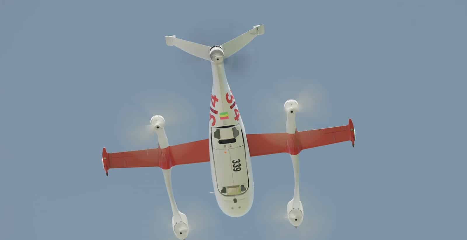 Zipline Platform 2 aircraft viewed from above, showing red wings and four rotors.